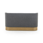 Featuring Krista Knoll Charcoal Dining Bench by Four Hands at Amethyst Home. Style takes shape. Comfortably curved bench seating is upholstered in a chunky charcoal boucle, with water-repellent high-performance fabric for modern sensibility. A plinth-style ash veneer base works casual contrast into the mix. Perfectly sized for a cozy breakfast nook; pair u. Amethyst Home provides interior design, new home construction design consulting, vintage area rugs, and lighting in the Washington metro area.