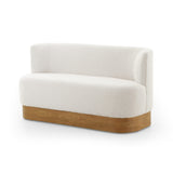 Featuring Krista Knoll Natural Dining Bench by Four Hands at Amethyst Home. Style takes shape. Comfortably curved bench seating is upholstered in a chunky off-white boucle, with water-repellent performance fabric for a modern touch. A plinth-style ash veneer base works casual contrast into the mix. Perfectly sized for a cozy breakfast nook; pair up to suit a. Amethyst Home provides interior design, new home construction design consulting, vintage area rugs, and lighting in the Portland metro area.