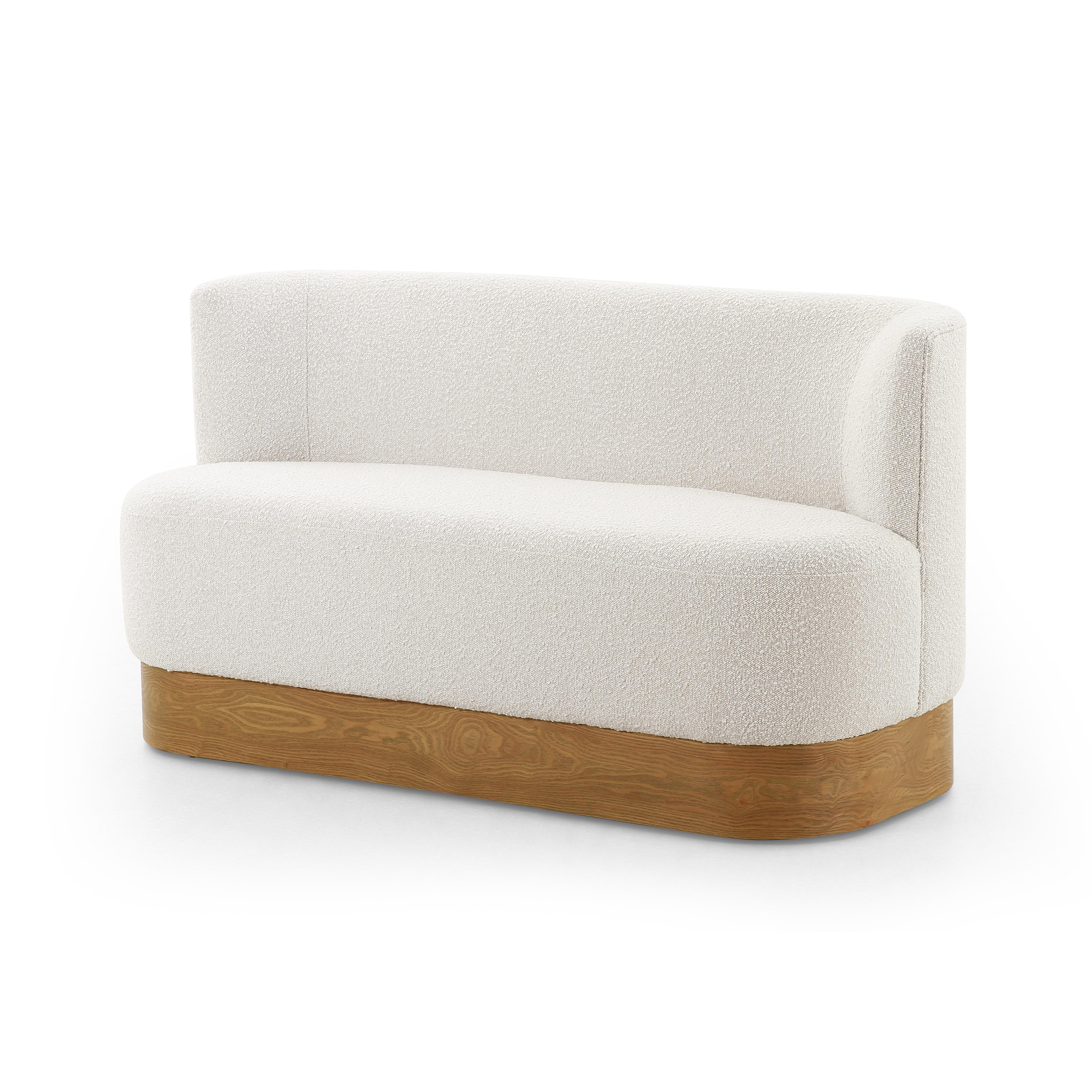 Featuring Krista Knoll Natural Dining Bench by Four Hands at Amethyst Home. Style takes shape. Comfortably curved bench seating is upholstered in a chunky off-white boucle, with water-repellent performance fabric for a modern touch. A plinth-style ash veneer base works casual contrast into the mix. Perfectly sized for a cozy breakfast nook; pair up to suit a. Amethyst Home provides interior design, new home construction design consulting, vintage area rugs, and lighting in the Portland metro area.