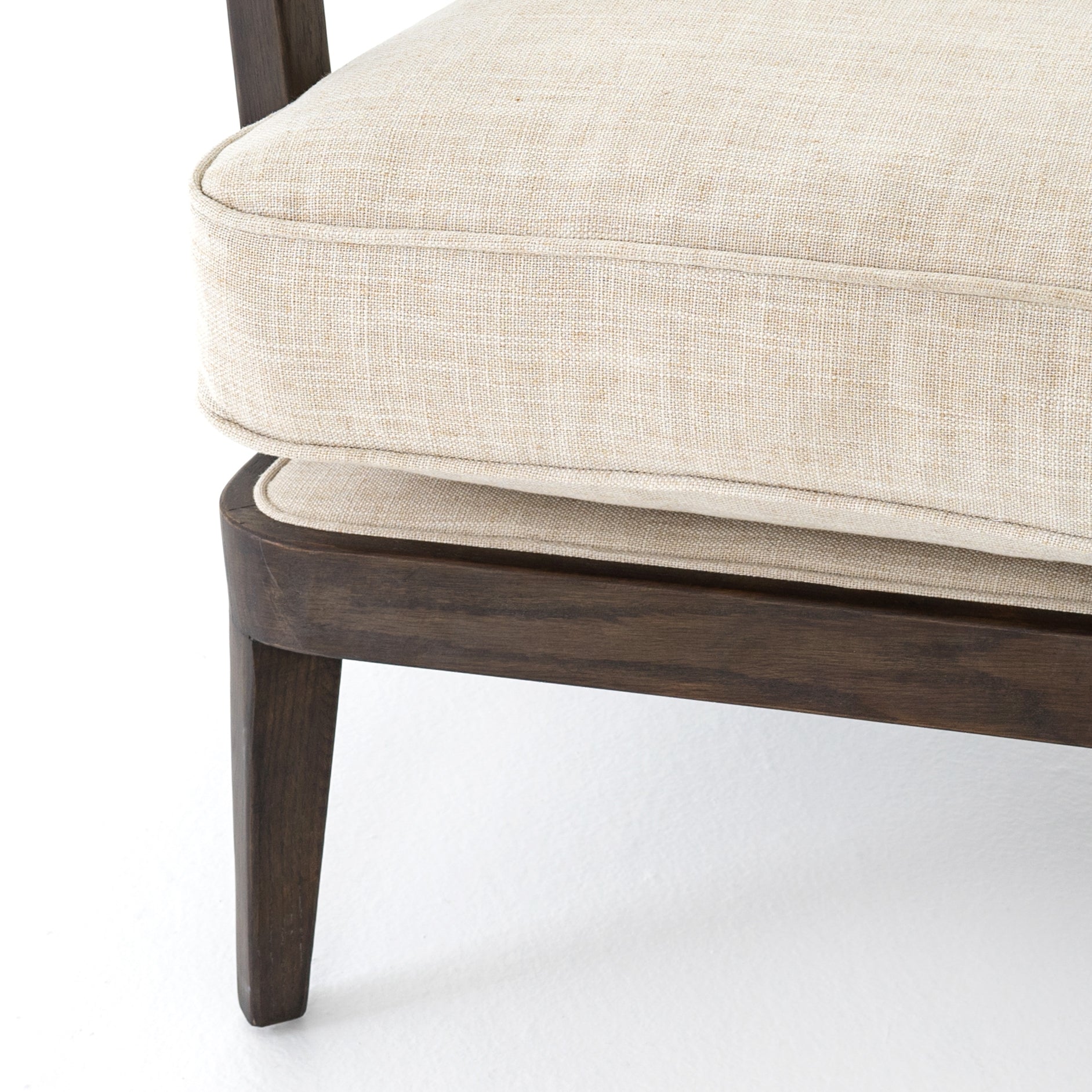 A solid frame of burnt oak features a high, ladder back design for a regal air. Ivory, performance fabric-upholstered seating meets style with livability. Performance fabrics are specially created to withstand spills, stains, high traffic and wear, ensuring long-term comfort and unmatched durability. Amethyst Home provides interior design, new construction, custom furniture, and area rugs in the Newport Beach metro area.