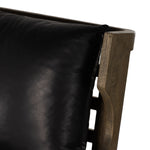 Featuring Lennon Heirloom Black Chair by Four Hands at Amethyst Home. A solid frame of warm oak features a high, ladder back design for a regal air. Upholstered in heirloom black leather. Sourced from one of the oldest family-owned tanneries in Italyâ€™s Bassano del Grappa, heirloom leather is salvaged and processed from upcycled hides featuring an abundance of natural markings, . Amethyst Home provides interior design, new construction, custom furniture, and area rugs in the Nashville metro area.