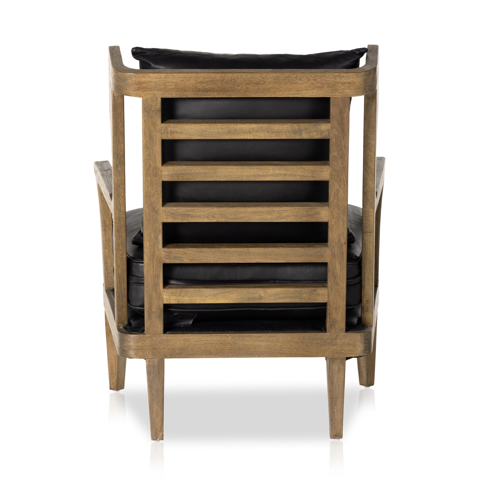 A solid frame of warm oak features a high, ladder back design for a regal air. Upholstered in heirloom black leather. Sourced from one of the oldest family-owned tanneries in Italyâ€™s Bassano del Grappa, heirloom leather is salvaged and processed from upcycled hides featuring an abundance of natural markings, scars and color variations. Amethyst Home provides interior design, new construction, custom furniture, and area rugs in the Park City metro area.