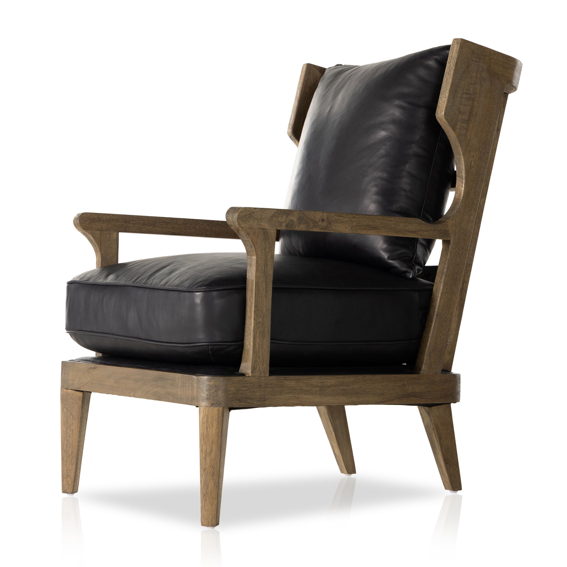 A solid frame of warm oak features a high, ladder back design for a regal air. Upholstered in heirloom black leather. Sourced from one of the oldest family-owned tanneries in Italyâ€™s Bassano del Grappa, heirloom leather is salvaged and processed from upcycled hides featuring an abundance of natural markings, scars and color variations. Amethyst Home provides interior design, new construction, custom furniture, and area rugs in the Washington metro area.