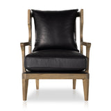 Featuring Lennon Heirloom Black Chair by Four Hands at Amethyst Home. A solid frame of warm oak features a high, ladder back design for a regal air. Upholstered in heirloom black leather. Sourced from one of the oldest family-owned tanneries in Italyâ€™s Bassano del Grappa, heirloom leather is salvaged and processed from upcycled hides featuring an abundance of natural markin. Amethyst Home provides interior design, new construction, custom furniture, and area rugs in the Winter Garden metro area.