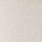 The classic wingback chair is updated with a midcentury-style base. Flared arms and a high winged back with blind tufting offer all-around comfort. Upholstered in a heavily textured boucle performance fabric bringing movement and everyday function to the piece. Amethyst Home provides interior design, new construction, custom furniture, and area rugs in the Dallas metro area.