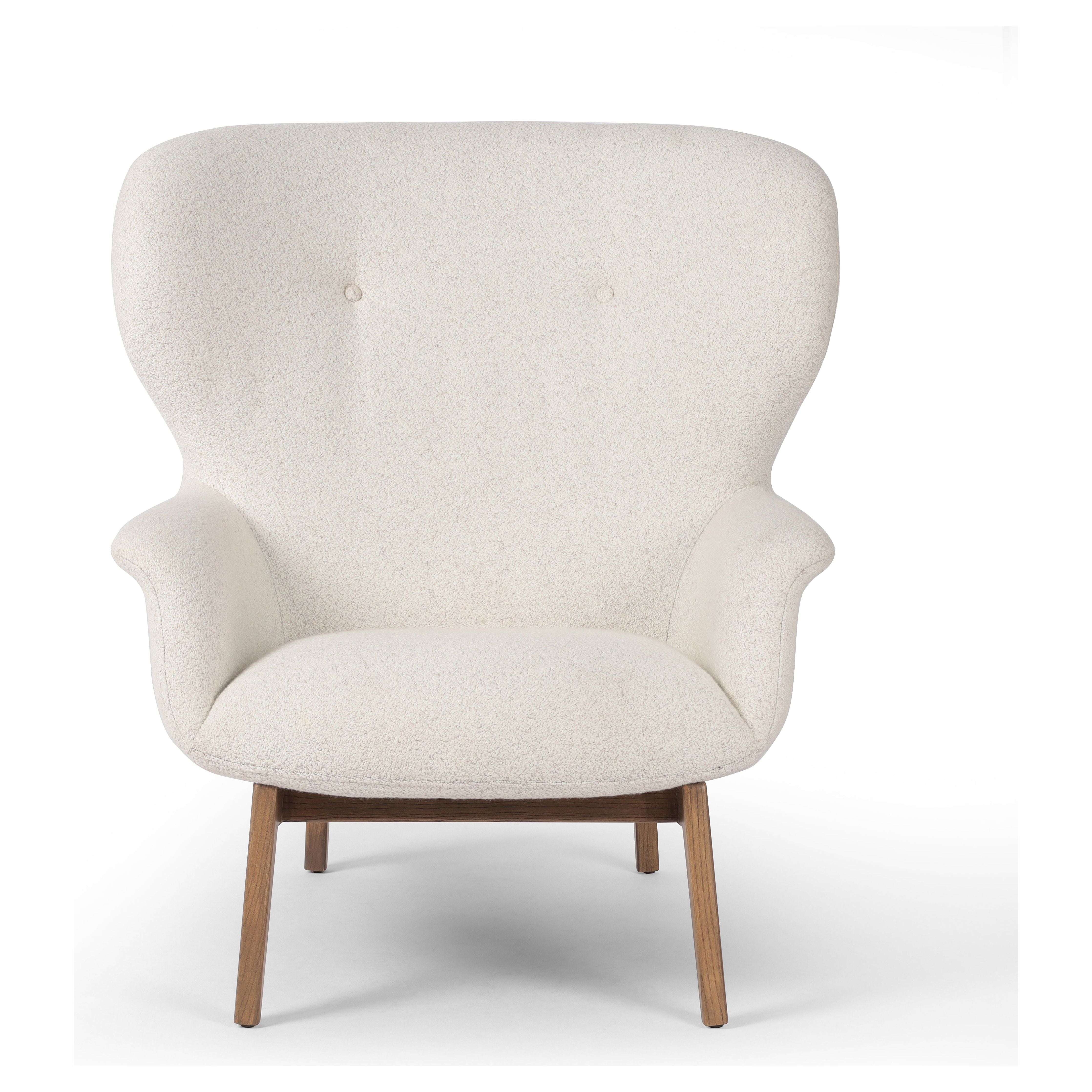 The classic wingback chair is updated with a midcentury-style base. Flared arms and a high winged back with blind tufting offer all-around comfort. Upholstered in a heavily textured boucle performance fabric bringing movement and everyday function to the piece. Amethyst Home provides interior design, new construction, custom furniture, and area rugs in the Salt Lake City metro area.