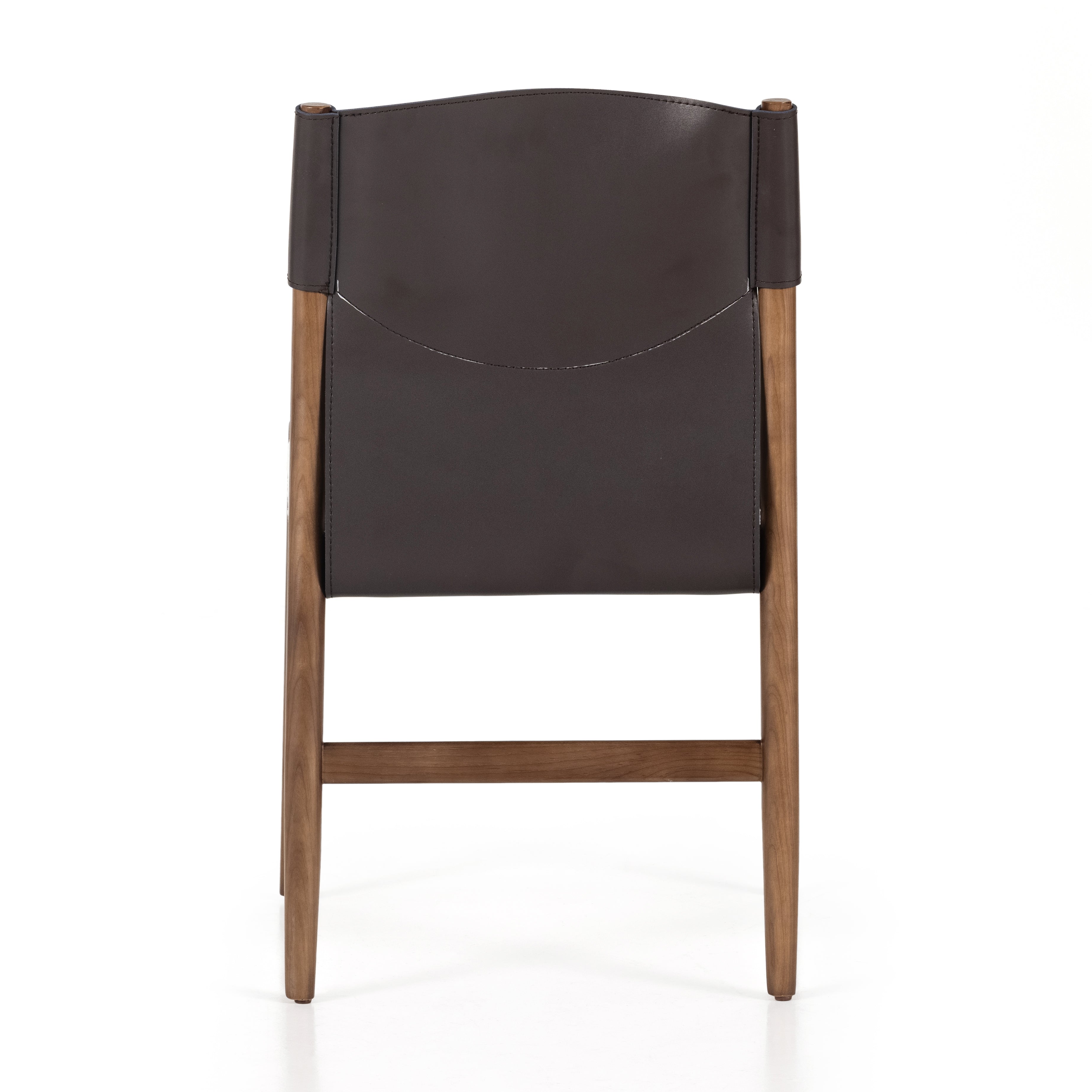 Sleek, streamlined seating with a midcentury vibe. Lulu Espresso Leather Armless Dining Chair features a sling leather seatback and a faux shearling seat in liquid-repellent performance fabric. Frame and legs made of solid ash wood. Amethyst Home provides interior design services, furniture, rugs, and lighting in the Kansas City metro area.