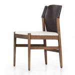 Sleek, streamlined seating with a midcentury vibe. Lulu Espresso Leather Armless Dining Chair features a sling leather seatback and a faux shearling seat in liquid-repellent performance fabric. Frame and legs made of solid ash wood. Amethyst Home provides interior design services, furniture, rugs, and lighting in the Omaha metro area.