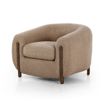 Lyla Sheepskin Camel Chair is a fresh take on the traditional tub chair, with exaggerated depth for drama and comfort. Solid wood legs intersect sheepskin upholstery for clean contrast and scale. Amethyst Home provides interior design services, furniture, rugs, and lighting in the Dallas metro area.