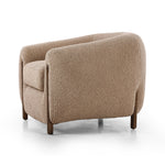 Lyla Sheepskin Camel Chair is a fresh take on the traditional tub chair, with exaggerated depth for drama and comfort. Solid wood legs intersect sheepskin upholstery for clean contrast and scale. Amethyst Home provides interior design services, furniture, rugs, and lighting in the Omaha metro area.