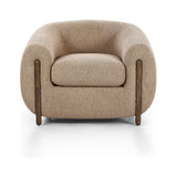 Lyla Sheepskin Camel Chair is a fresh take on the traditional tub chair, with exaggerated depth for drama and comfort. Solid wood legs intersect sheepskin upholstery for clean contrast and scale. Amethyst Home provides interior design services, furniture, rugs, and lighting in the Salt Lake City metro area.