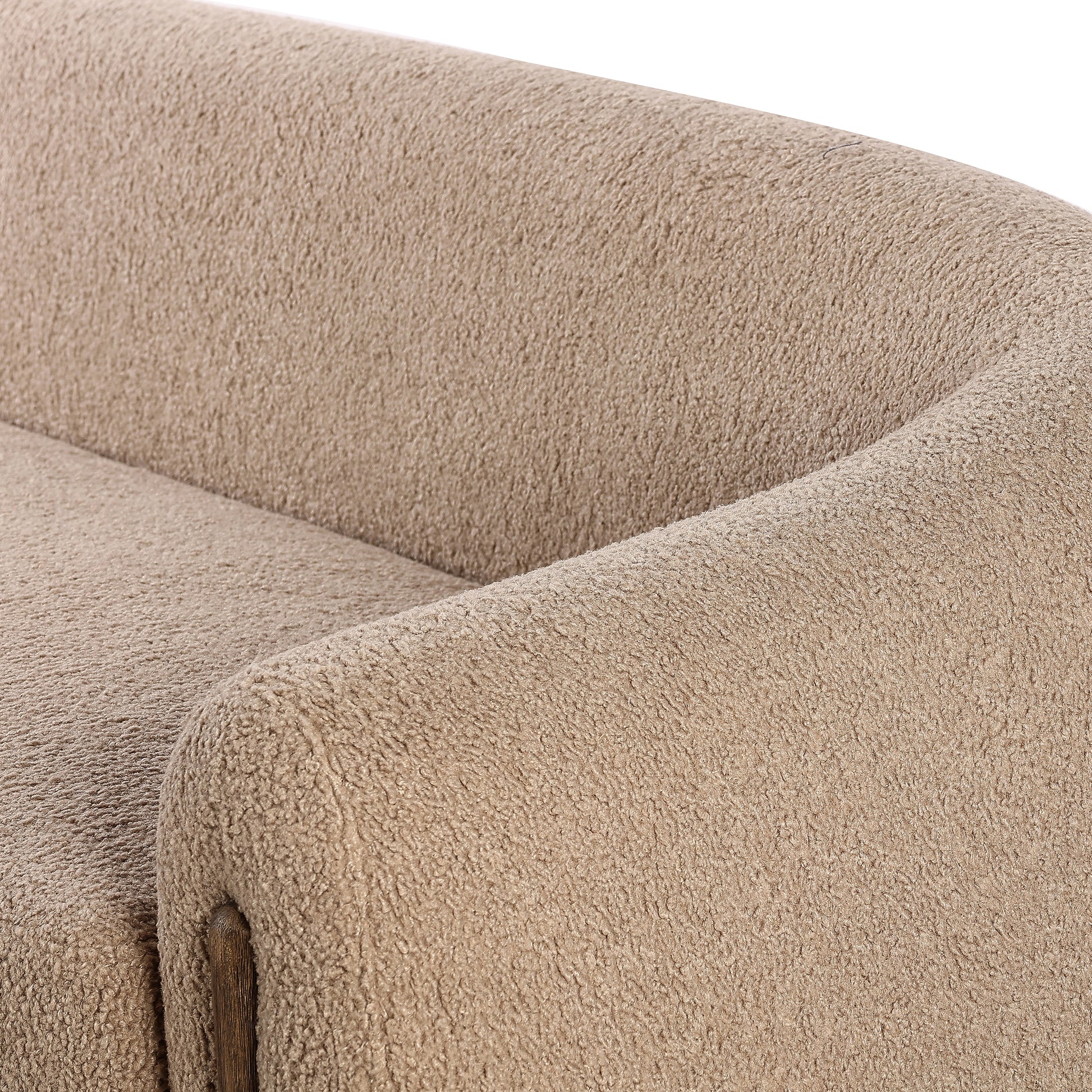 Lyla Sheepskin Camel Sofa is a fresh, elongated take on the traditional tub chair, with exaggerated depth for drama and comfort. Solid wood legs intersect sheepskin upholstery on this plush sofa for clean contrast and scale. Amethyst Home provides interior design services, furniture, rugs, and lighting in the Omaha metro area.