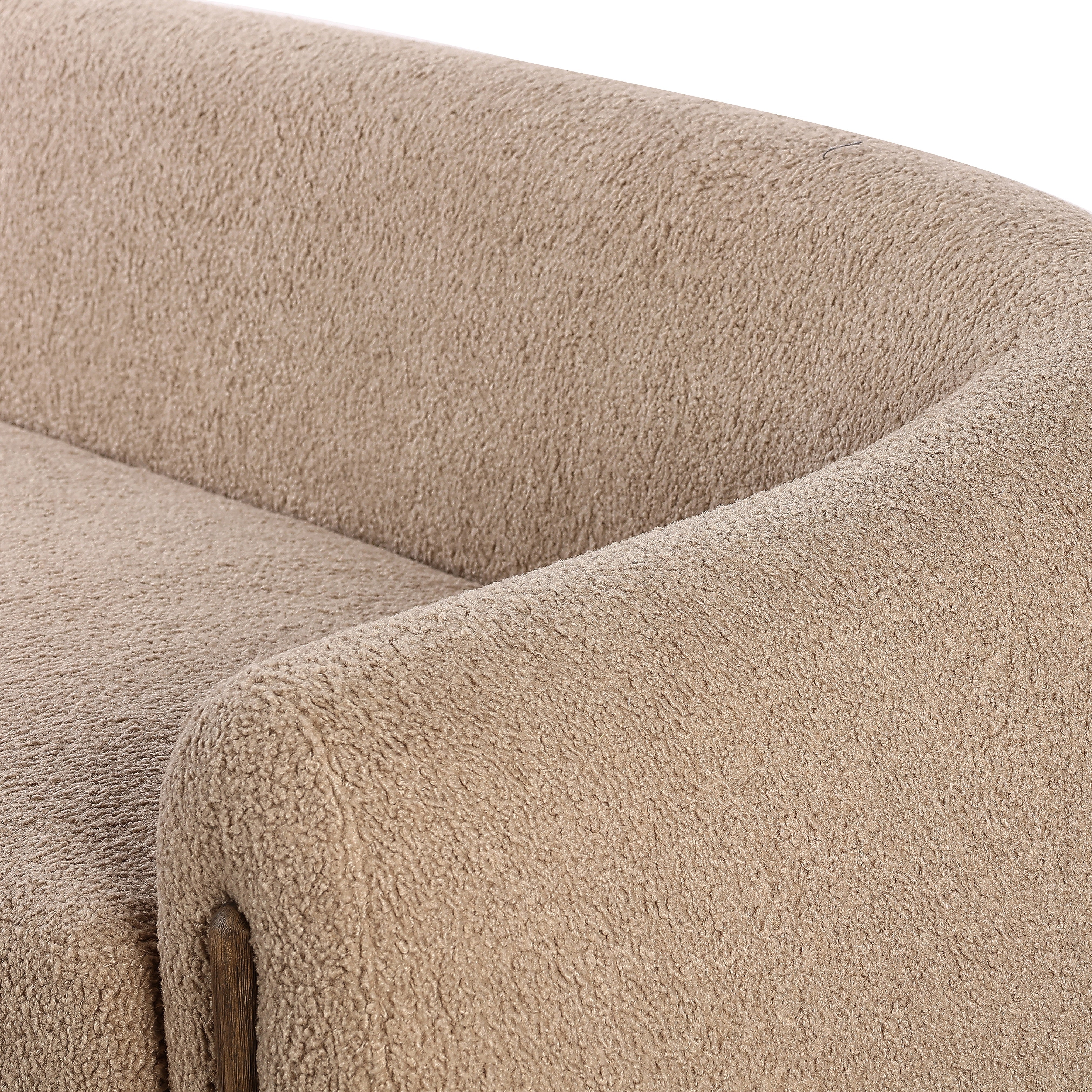 Lyla Sheepskin Camel Sofa is a fresh, elongated take on the traditional tub chair, with exaggerated depth for drama and comfort. Solid wood legs intersect sheepskin upholstery on this plush sofa for clean contrast and scale. Amethyst Home provides interior design services, furniture, rugs, and lighting in the Omaha metro area.
