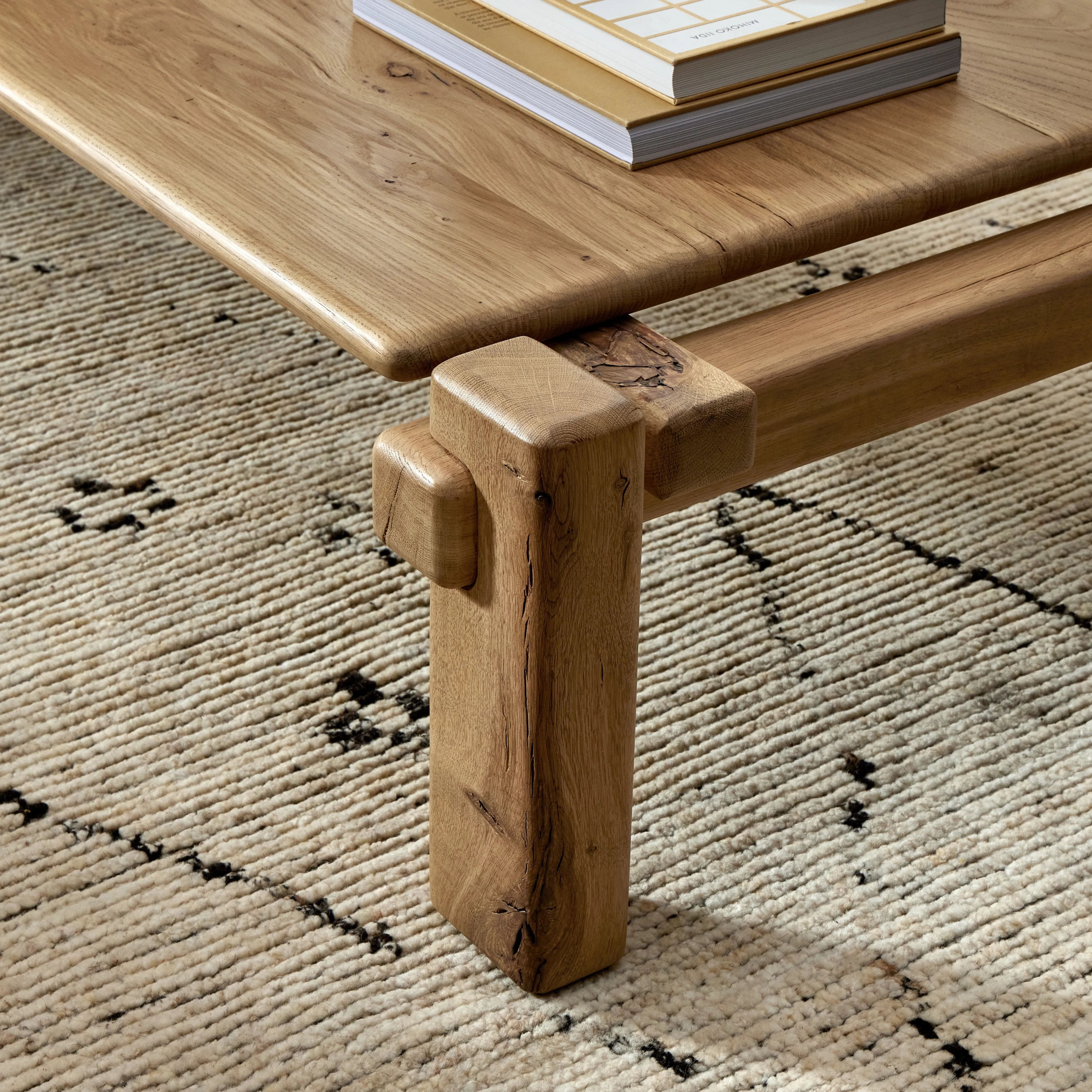Featuring Marcia French Oak Large Coffee Table by Four Hands at Amethyst Home. Designed by Thomas Bina and Ronald Sasson, a design partnership blending both modern minimalist and Brazilian influences. Crafted from natural reclaimed French oak with overstated joint details. Rounded edges bring a soft, playful feel to the entire piece.Overall Dimensions: 31.5. Amethyst Home provides interior design, new home construction design consulting, vintage area rugs, and lighting in the San Diego metro area.