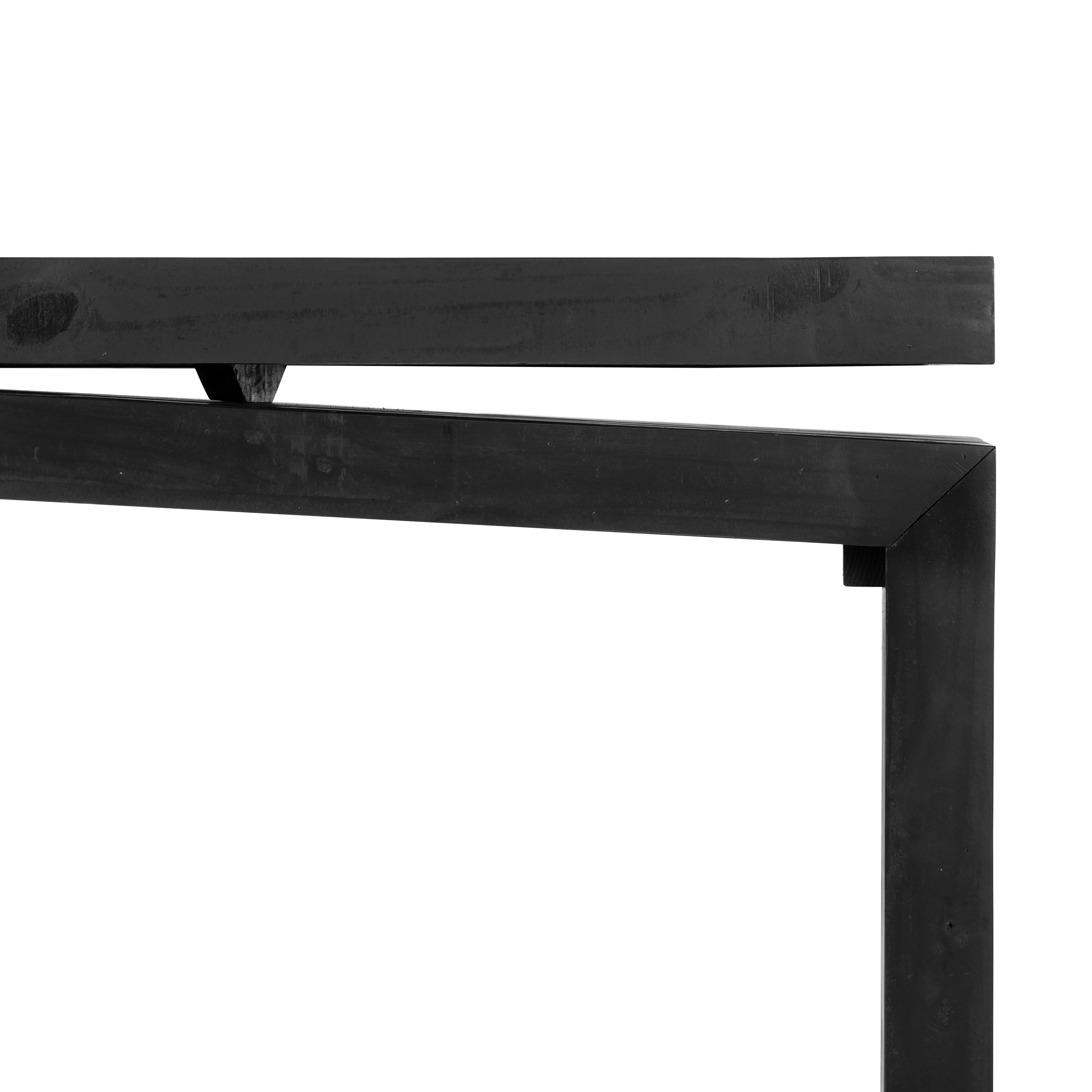Simple and streamlined to showcase natural beauty. Finished in a traditional black, solid reclaimed pine forms a modern media console with rustic vibes. Amethyst Home provides interior design, new home construction design consulting, vintage area rugs, and lighting in the Portland metro area.