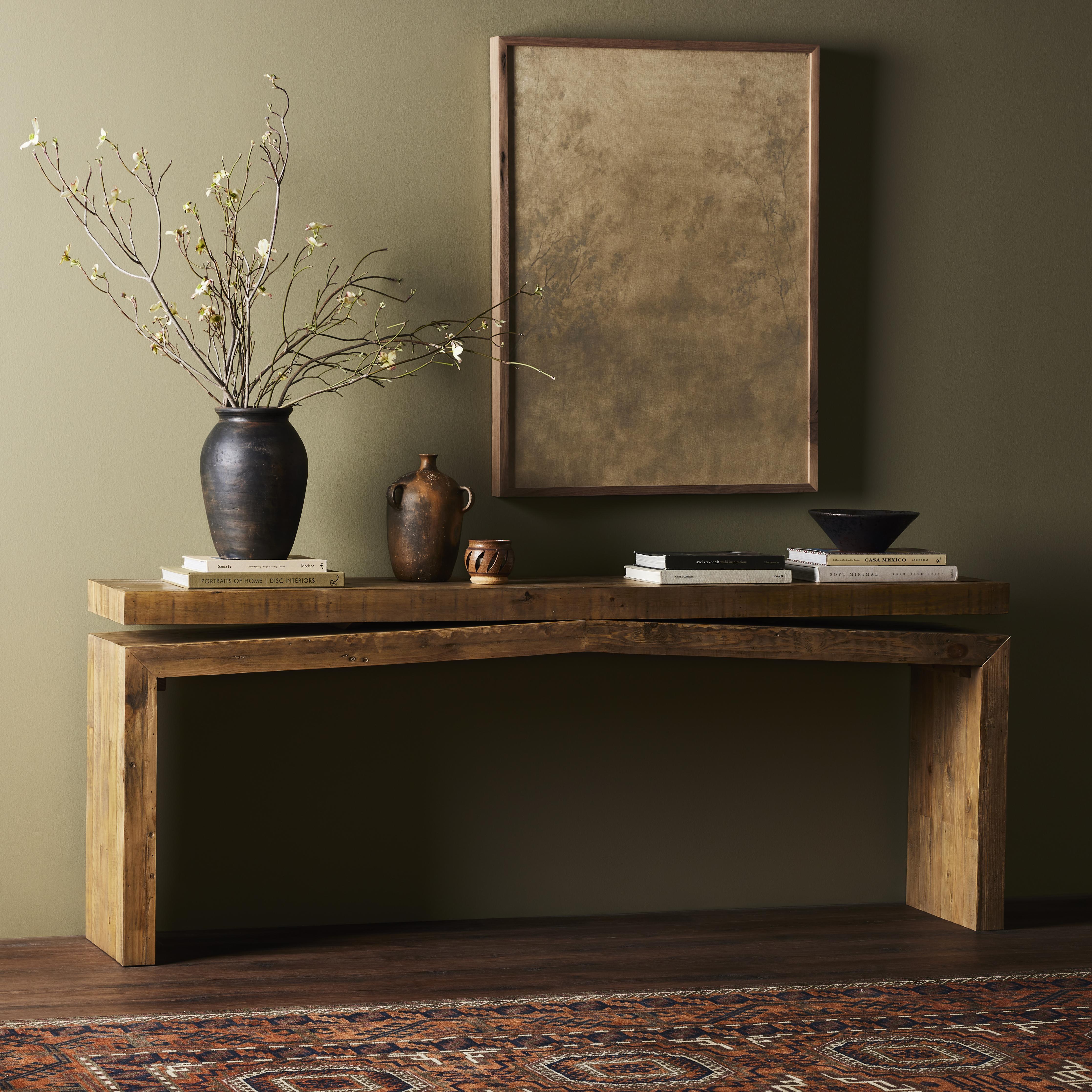 Simple and streamlined to showcase natural beauty. Mixed reclaimed woods fashion a modern media console, for an open look with organic vibes. Amethyst Home provides interior design, new home construction design consulting, vintage area rugs, and lighting in the Winter Garden metro area.