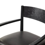 Featuring Mavery Sierra Espresso Dining Chair by Four Hands at Amethyst Home. Classic midcentury form meets monochromatic comfort. The tapered-leg design of this oak dining armchair is finished with an espresso-brown upholstered cushion for a sleek, inviting seat.Collection: AshfordColors: Sierra Espresso ,Brushed Ebony Oak ,Brushed Ebony Oak VeneerMaterials:. Amethyst Home provides interior design, new home construction design consulting, vintage area rugs, and lighting in the Houston metro area.