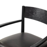 Featuring Mavery Sierra Espresso Dining Chair by Four Hands at Amethyst Home. Classic midcentury form meets monochromatic comfort. The tapered-leg design of this oak dining armchair is finished with an espresso-brown upholstered cushion for a sleek, inviting seat.Collection: AshfordColors: Sierra Espresso ,Brushed Ebony Oak ,Brushed Ebony Oak VeneerMaterials:. Amethyst Home provides interior design, new home construction design consulting, vintage area rugs, and lighting in the Houston metro area.