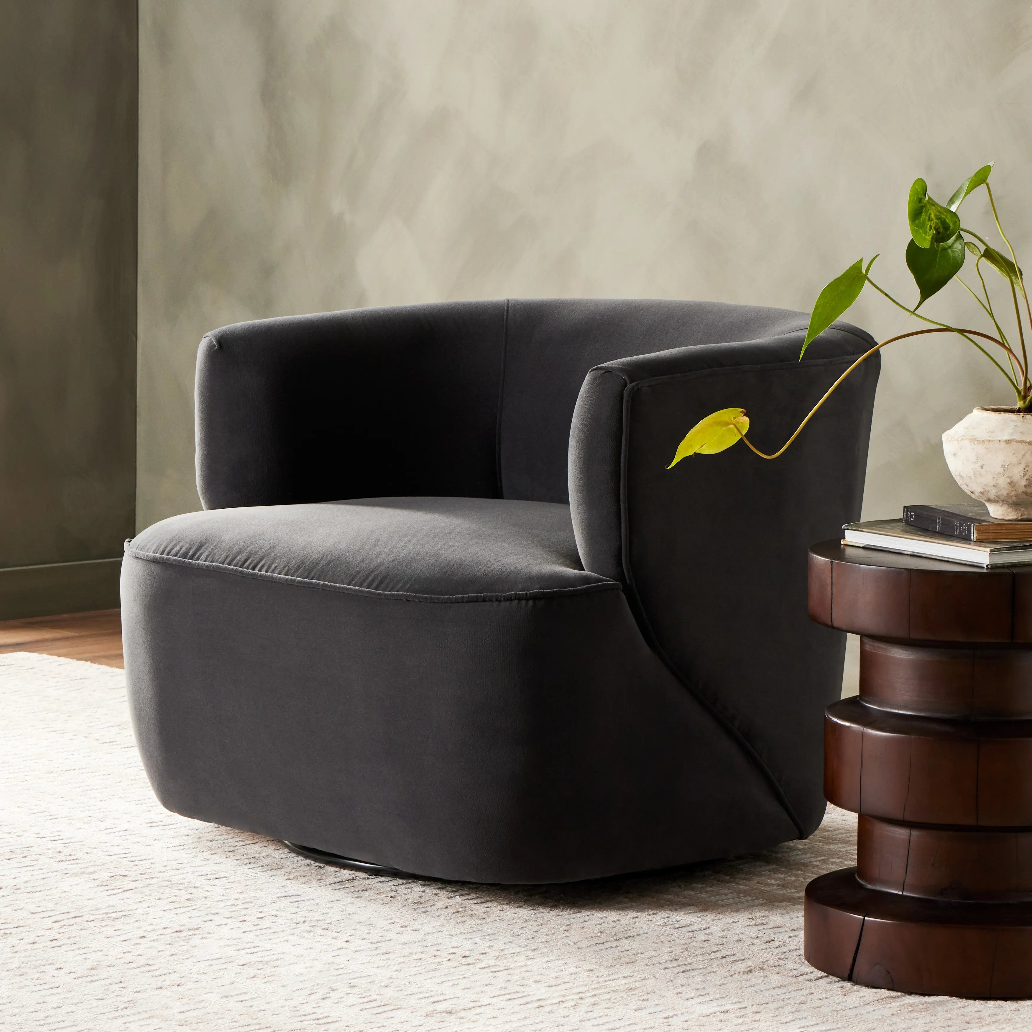 Featuring Mila Swivel Chair - Henry Charcoal by Four Hands at Amethyst Home. Charcoal high-performance fabric pairs with a hidden 360-degree swivel. Performance fabrics are specially created to withstand spills, stains, high traffic and wear, ensuring long-term comfort and unmatched durability.Overall Dimensions: 33"W x 35.5"L x 27"H
Collection: AtelierCol. Amethyst Home provides interior design, new home construction design consulting, vintage area rugs, and lighting in the Des Moines metro area.