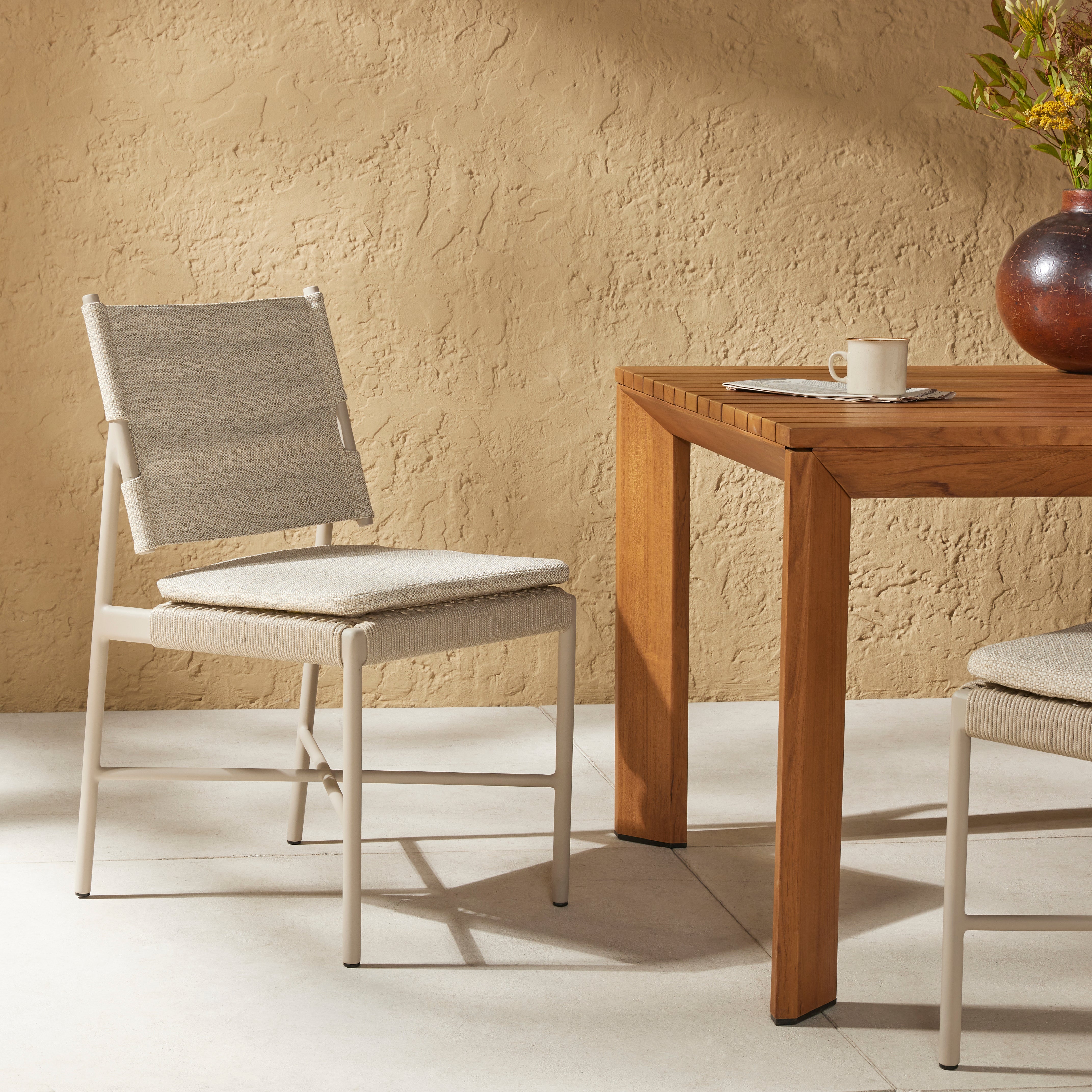 Featuring Miller Dove Taupe Outdoor Dining Chair by Four Hands at Amethyst Home. Make a beautifully monochromatic statement, indoors or out. Finished in a light taupe, slim, airy aluminum frames all-weather wicker seating with a top cushion for added comfort. Cover or store indoors during inclement weather and when not in use.Overall Dimensions: 19"W x 22"L x 35"H
Collection: So. Amethyst Home provides interior design, new construction, custom furniture, and area rugs in the Des Moines metro area.