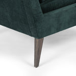 Featuring Olson Emerald Worn Velvet Chair by Four Hands at Amethyst Home. A clean, sophisticated silhouette meets velvety emerald upholstery with side-arm cutouts, for a balanced look with a mid-century air. Tapered oak legs add a feminine finishing touch. Performance fabrics are specially created to withstand spills, stains, high traffic and wear, ensuring long-term comfort and unm. Amethyst Home provides interior design, new construction, custom furniture, and area rugs in the Dallas metro area.