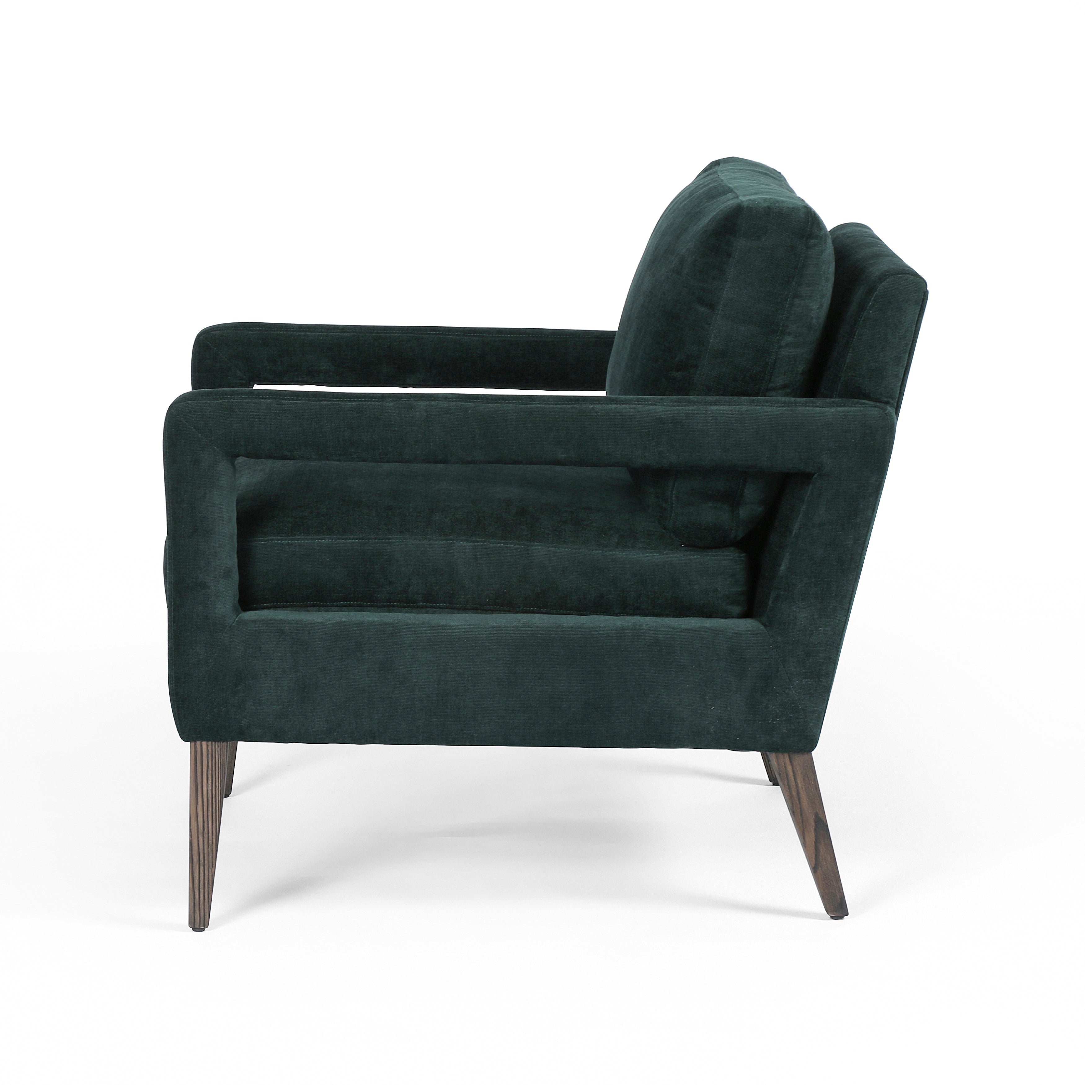 Featuring Olson Emerald Worn Velvet Chair by Four Hands at Amethyst Home. A clean, sophisticated silhouette meets velvety emerald upholstery with side-arm cutouts, for a balanced look with a mid-century air. Tapered oak legs add a feminine finishing touch. Performance fabrics are specially created to withstand spills, stains, high traffic and wear, ensuring long-term comfort and u. Amethyst Home provides interior design, new construction, custom furniture, and area rugs in the Monterey metro area.