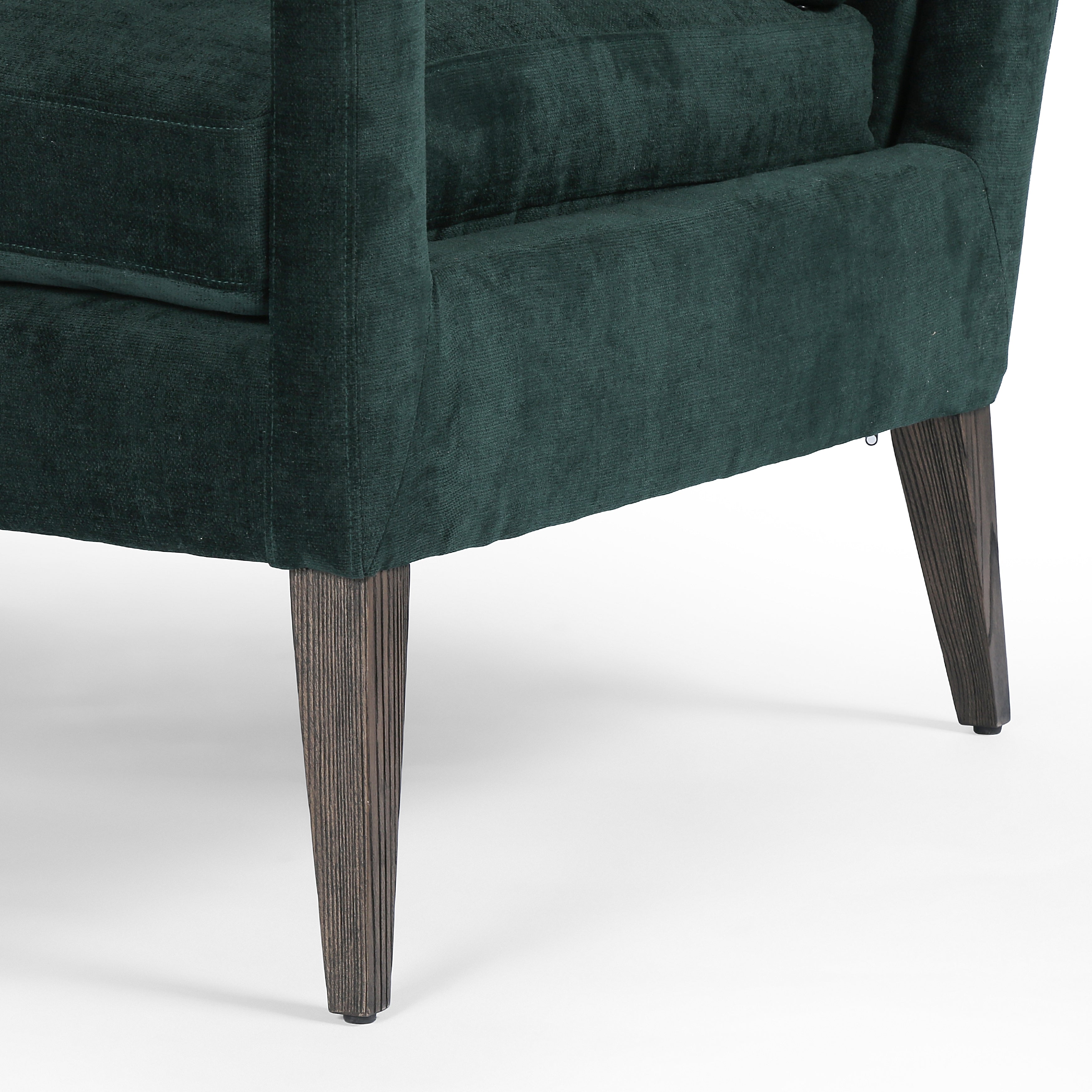 Featuring Olson Emerald Worn Velvet Chair by Four Hands at Amethyst Home. A clean, sophisticated silhouette meets velvety emerald upholstery with side-arm cutouts, for a balanced look with a mid-century air. Tapered oak legs add a feminine finishing touch. Performance fabrics are specially created to withstand spills, stains, high traffic and wear, ensuring long-term comfort and . Amethyst Home provides interior design, new construction, custom furniture, and area rugs in the Nashville metro area.