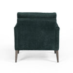 Featuring Olson Emerald Worn Velvet Chair by Four Hands at Amethyst Home. A clean, sophisticated silhouette meets velvety emerald upholstery with side-arm cutouts, for a balanced look with a mid-century air. Tapered oak legs add a feminine finishing touch. Performance fabrics are specially created to withstand spills, stains, high traffic and wear, ensuring long-term comfort and . Amethyst Home provides interior design, new construction, custom furniture, and area rugs in the Park City metro area.