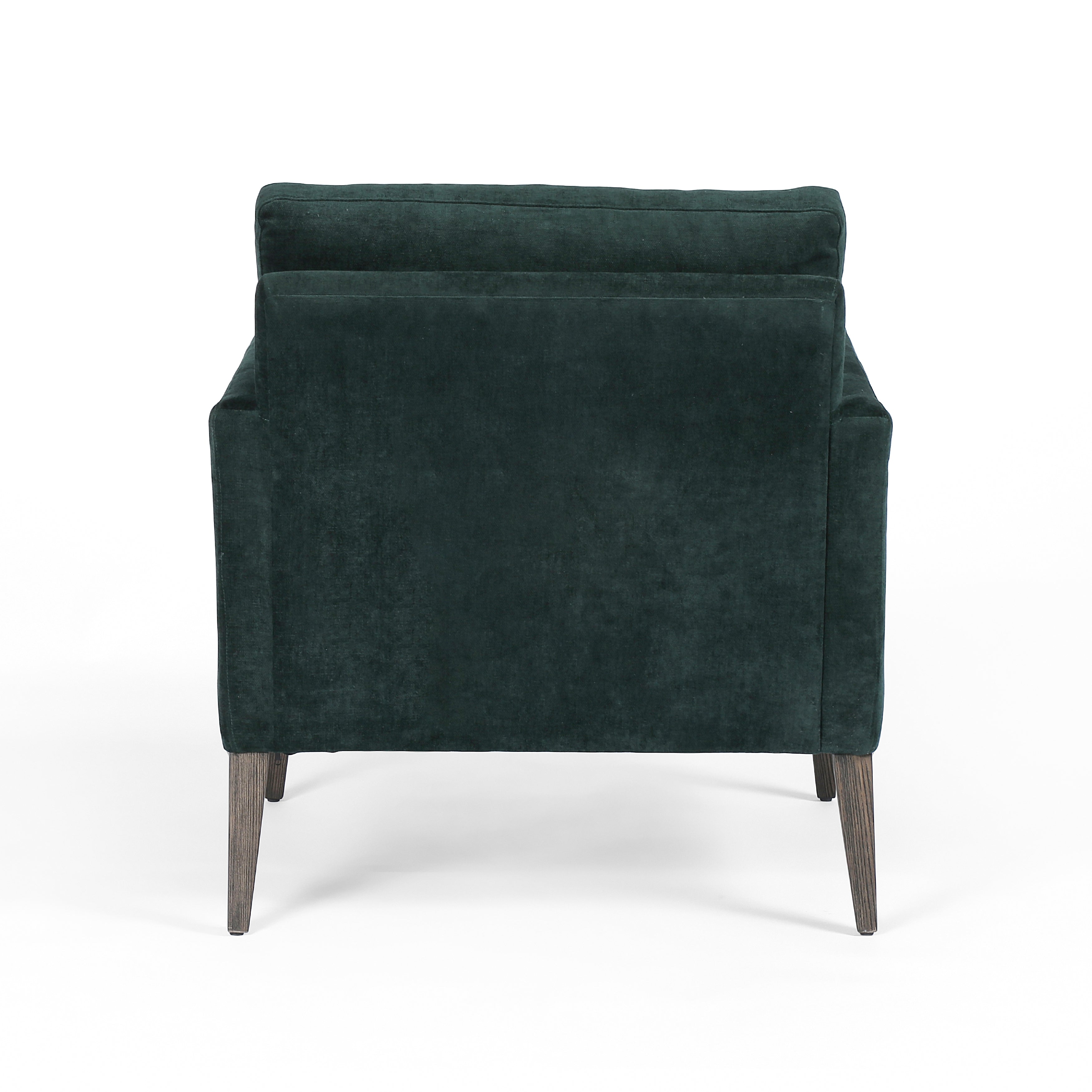 Featuring Olson Emerald Worn Velvet Chair by Four Hands at Amethyst Home. A clean, sophisticated silhouette meets velvety emerald upholstery with side-arm cutouts, for a balanced look with a mid-century air. Tapered oak legs add a feminine finishing touch. Performance fabrics are specially created to withstand spills, stains, high traffic and wear, ensuring long-term comfort and . Amethyst Home provides interior design, new construction, custom furniture, and area rugs in the Park City metro area.