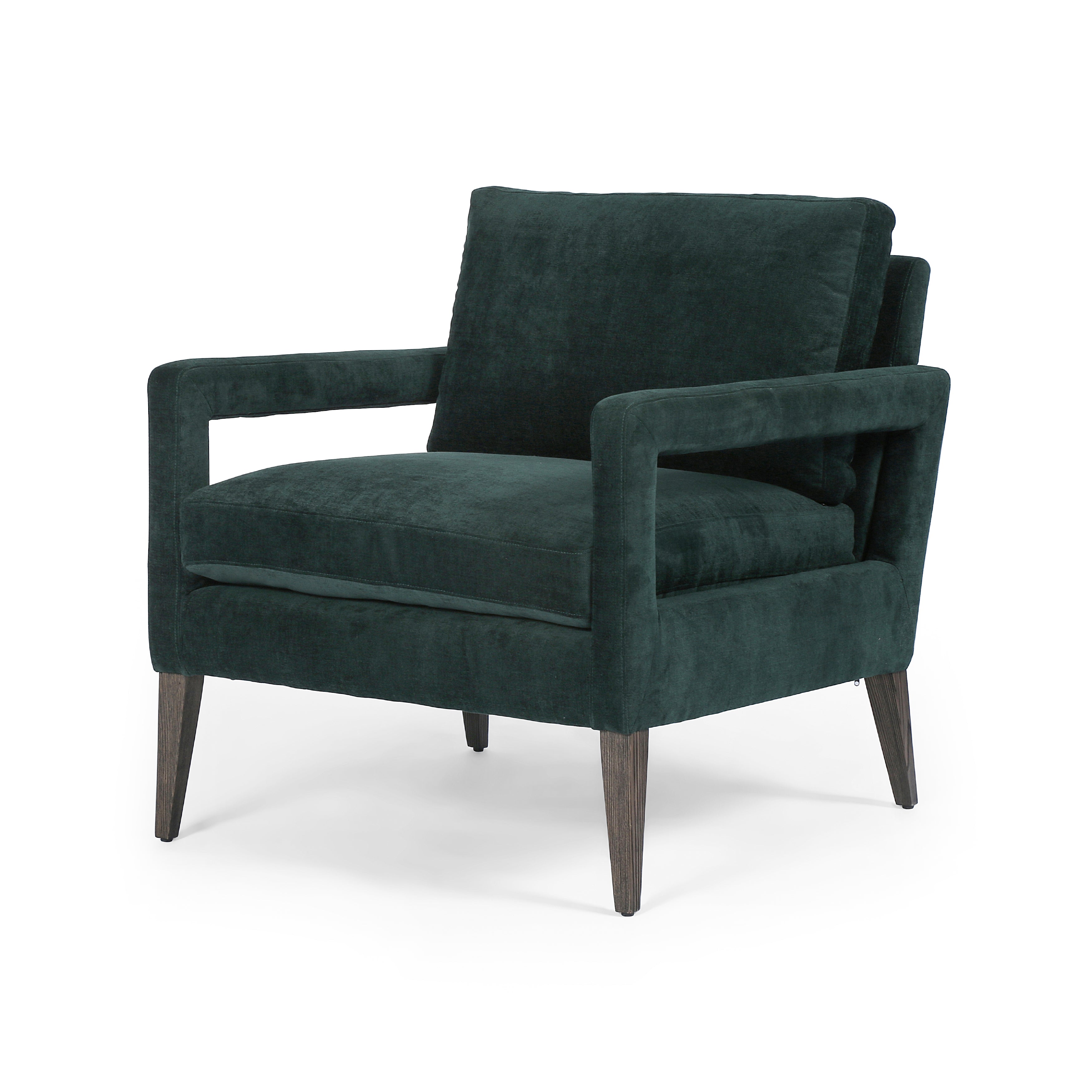 Featuring Olson Emerald Worn Velvet Chair by Four Hands at Amethyst Home. A clean, sophisticated silhouette meets velvety emerald upholstery with side-arm cutouts, for a balanced look with a mid-century air. Tapered oak legs add a feminine finishing touch. Performance fabrics are specially created to withstand spills, stains, high traffic and wear, ensuring long-term comfort and . Amethyst Home provides interior design, new construction, custom furniture, and area rugs in the San Diego metro area.
