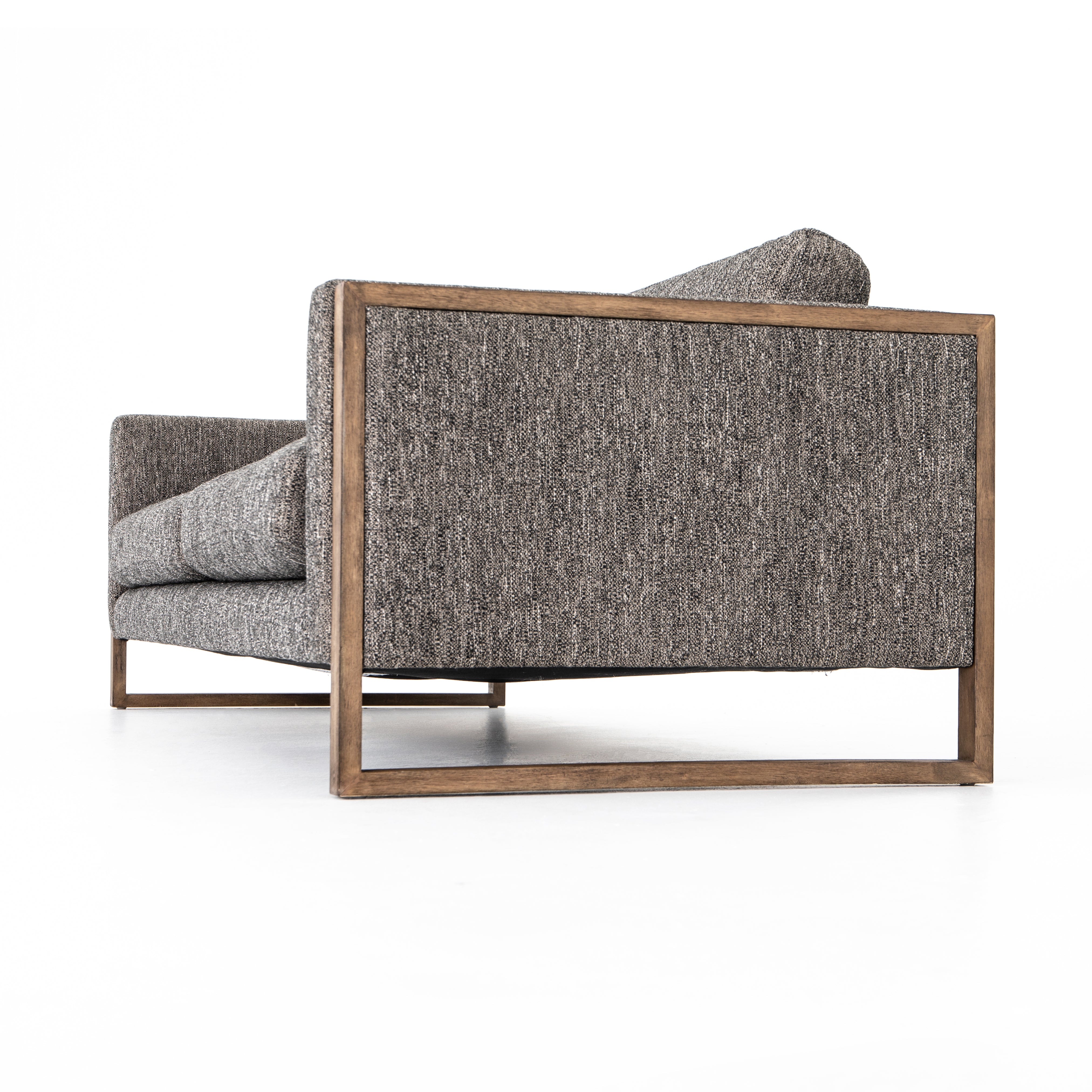 Crisp, clean comfort. Charcoal-colored upholstery of performance grade cradles within an exposed parawood frame, for detail-driven contrast. Performance fabrics are specially created to withstand spills, stains, high traffic and wear, ensuring long-term comfort and unmatched durability. Amethyst Home provides interior design, new construction, custom furniture, and area rugs in the Des Moines metro area.