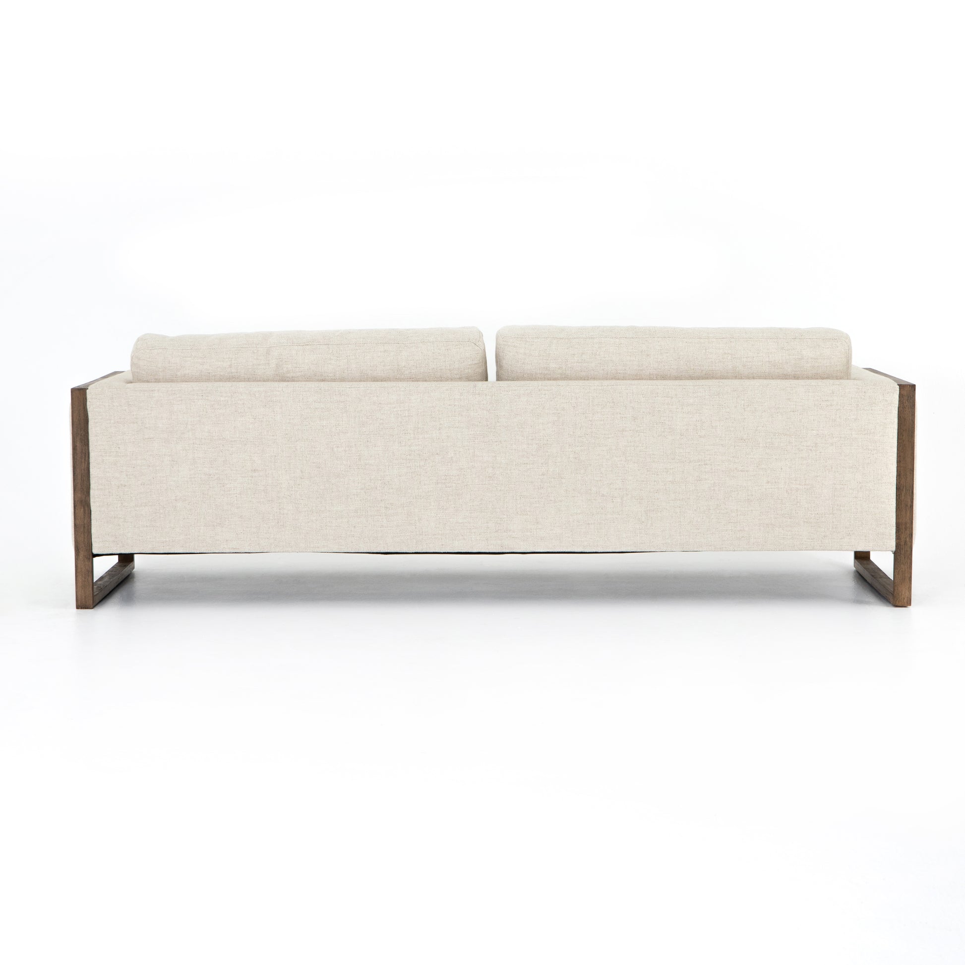 Crisp, clean comfort. Cream-colored upholstery of performance grade cradles within an exposed parawood frame, for detail-driven contrast. Performance fabrics are specially created to withstand spills, stains, high traffic and wear, ensuring long-term comfort and unmatched durability. Amethyst Home provides interior design, new construction, custom furniture, and area rugs in the Charlotte metro area.