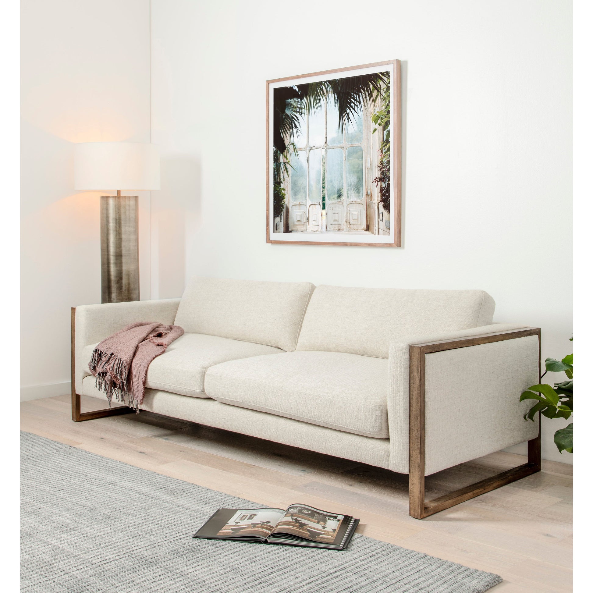 Crisp, clean comfort. Cream-colored upholstery of performance grade cradles within an exposed parawood frame, for detail-driven contrast. Performance fabrics are specially created to withstand spills, stains, high traffic and wear, ensuring long-term comfort and unmatched durability. Amethyst Home provides interior design, new construction, custom furniture, and area rugs in the Los Angeles metro area.