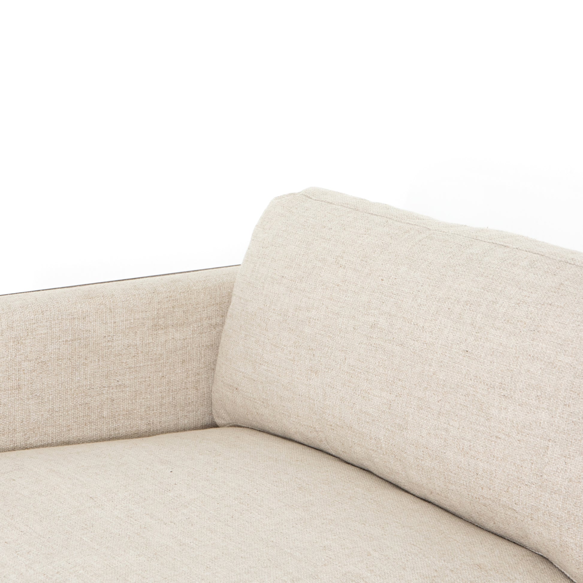 Crisp, clean comfort. Cream-colored upholstery of performance grade cradles within an exposed parawood frame, for detail-driven contrast. Performance fabrics are specially created to withstand spills, stains, high traffic and wear, ensuring long-term comfort and unmatched durability. Amethyst Home provides interior design, new construction, custom furniture, and area rugs in the Salt Lake City metro area.