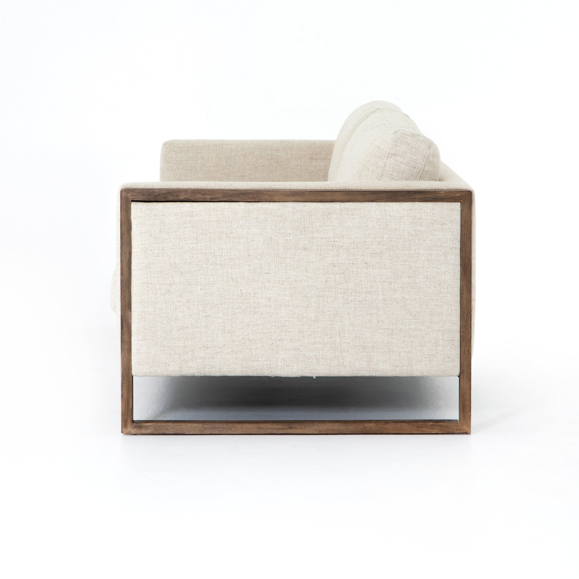 Crisp, clean comfort. Cream-colored upholstery of performance grade cradles within an exposed parawood frame, for detail-driven contrast. Performance fabrics are specially created to withstand spills, stains, high traffic and wear, ensuring long-term comfort and unmatched durability. Amethyst Home provides interior design, new construction, custom furniture, and area rugs in the Seattle metro area.