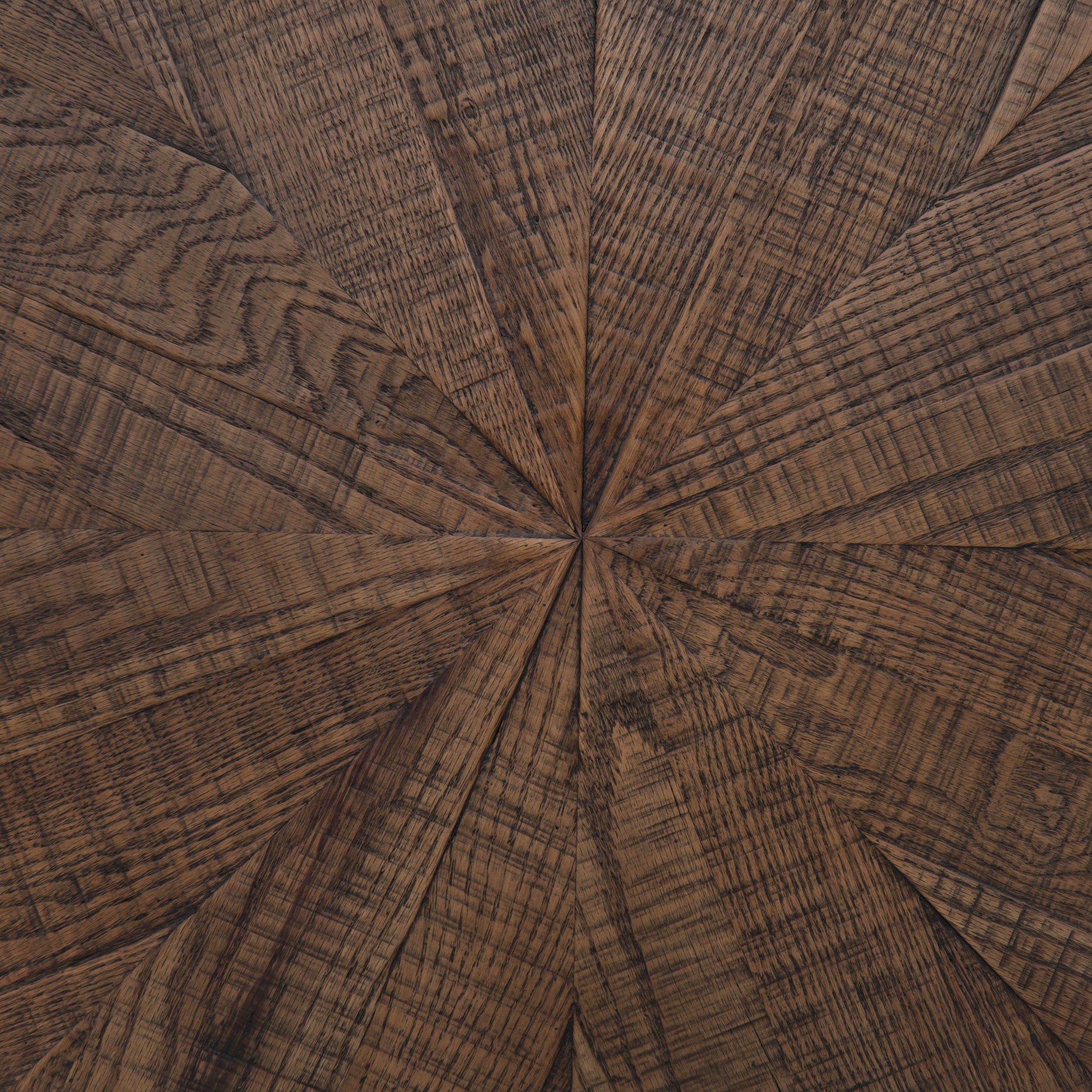 Bring on the drama. An ebony-finished oak top is cut in a starburst texture, framed by deep ebony sides, and encircled by bright brass-clad binding. Amethyst Home provides interior design, new construction, custom furniture, and area rugs in the Calabasas metro area.