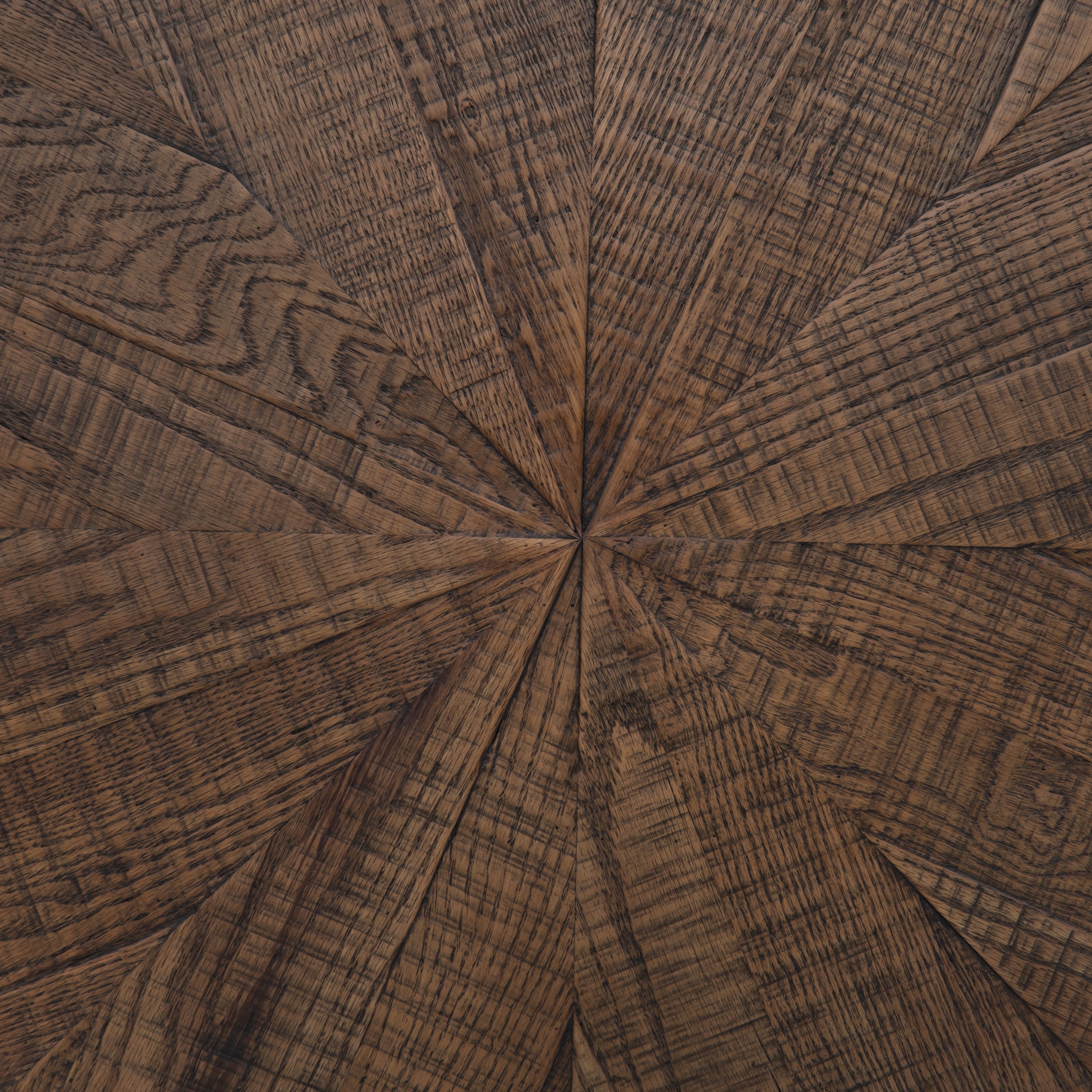 Bring on the drama. An ebony-finished oak top is cut in a starburst texture, framed by deep ebony sides, and encircled by bright brass-clad binding. Amethyst Home provides interior design, new construction, custom furniture, and area rugs in the Calabasas metro area.
