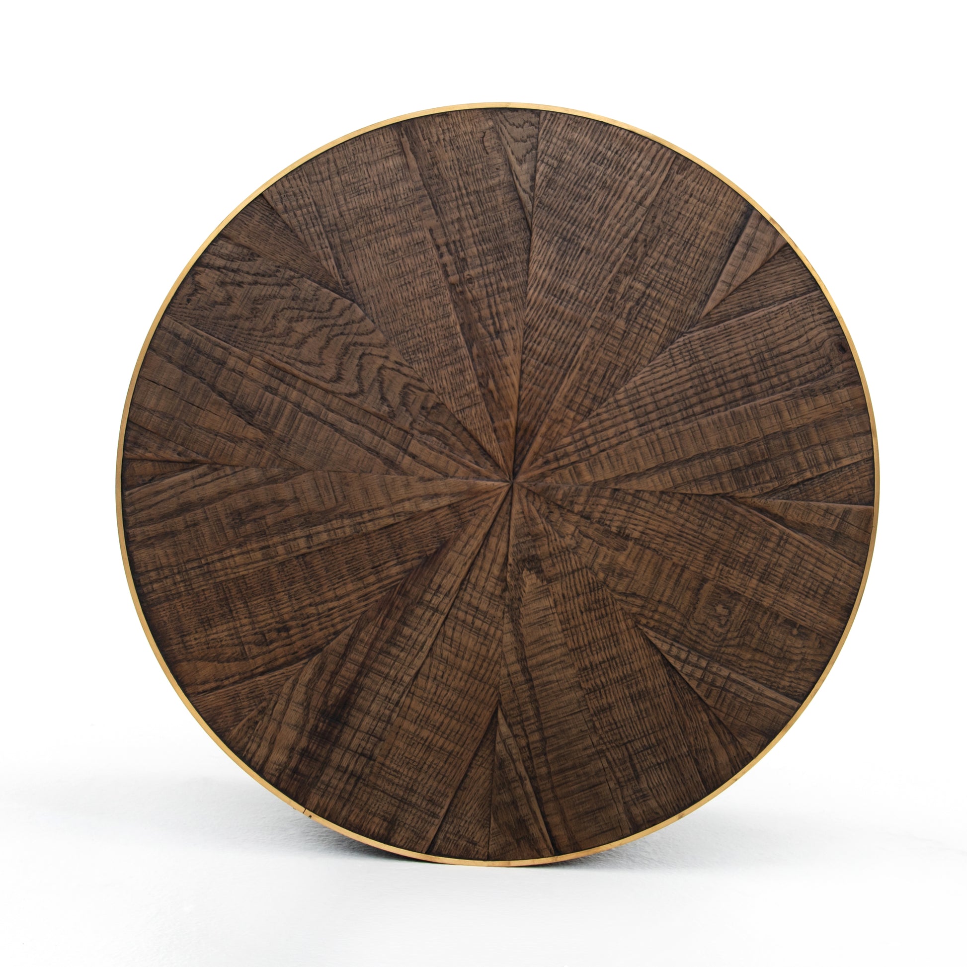Bring on the drama. An ebony-finished oak top is cut in a starburst texture, framed by deep ebony sides, and encircled by bright brass-clad binding. Amethyst Home provides interior design, new construction, custom furniture, and area rugs in the Des Moines metro area.