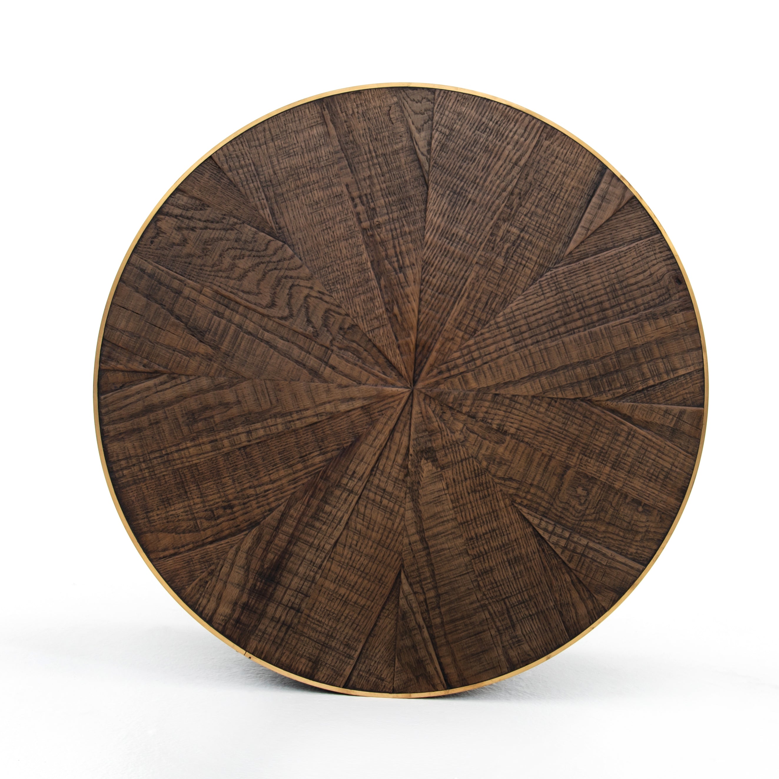 Bring on the drama. An ebony-finished oak top is cut in a starburst texture, framed by deep ebony sides, and encircled by bright brass-clad binding. Amethyst Home provides interior design, new construction, custom furniture, and area rugs in the Des Moines metro area.