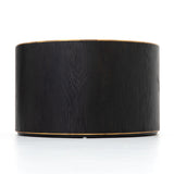 Bring on the drama. An ebony-finished oak top is cut in a starburst texture, framed by deep ebony sides, and encircled by bright brass-clad binding. Amethyst Home provides interior design, new construction, custom furniture, and area rugs in the Seattle metro area.