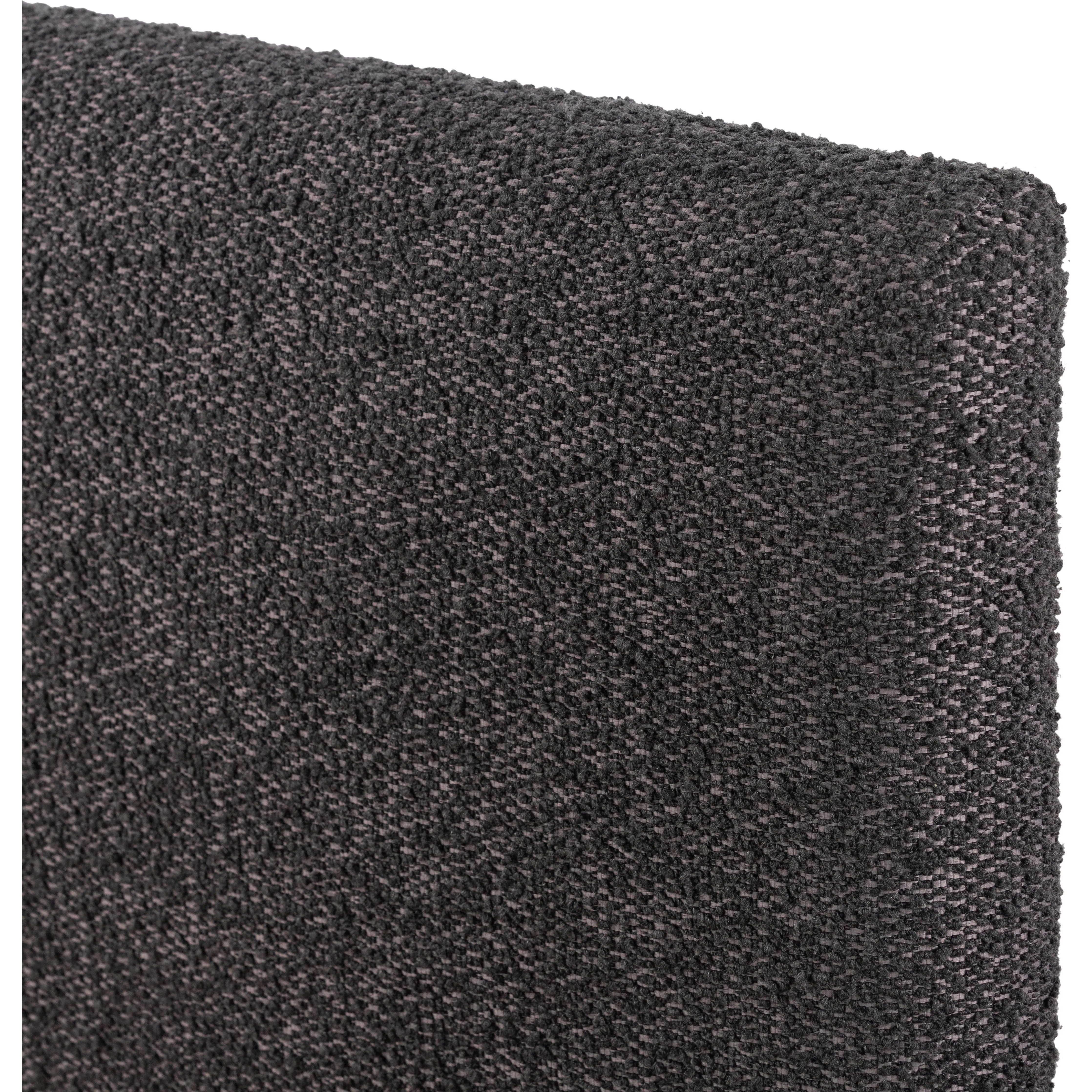 Modern, clean shaping meets inflated comfort with this padded, upholstered bed frame in a textural boucle-like pattern Amethyst Home provides interior design, new home construction design consulting, vintage area rugs, and lighting in the Winter Garden metro area.