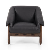 Featuring Reggie Heirloom Black Chair by Four Hands at Amethyst Home. Oversized cushioning brings a Brazilian midcentury feel to this vintage-inspired chair. Designed with cushion-wrapped slanted arms, fixed cushioning with a deep sit and narrow legs reminiscent of midcentury style. Upholstered in heirloom leather. Sourced from one of the oldest family-owne. Amethyst Home provides interior design, new home construction design consulting, vintage area rugs, and lighting in the Calabasas metro area.