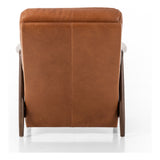 A sleek seat with hidden push-back reclining functionality. This midcentury-inspired recliner features wide chunky channeling paired with slim paddle arms and a tapered wood frame. Designed with a high seat and high back for extra comfy support. Upholstered in a timeless tobacco-hued leather made in a family-owned tannery in Thailand. Amethyst Home provides interior design, new construction, custom furniture, and area rugs in the Tampa metro area.