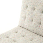 Featuring Romy Mabel Neutral Fleck Chair by Four Hands at Amethyst Home. Angular black-finished iron forms a slim hairpin frame for armless seating, with button tufting for texture. Light neutral upholstery features subtle flecks of color for a fun, fresh touch. Performance fabrics are specially created to withstand spills, stains, high traffic and wear, ensuring long-term comfort a. Amethyst Home provides interior design, new construction, custom furniture, and area rugs in the Dallas metro area.