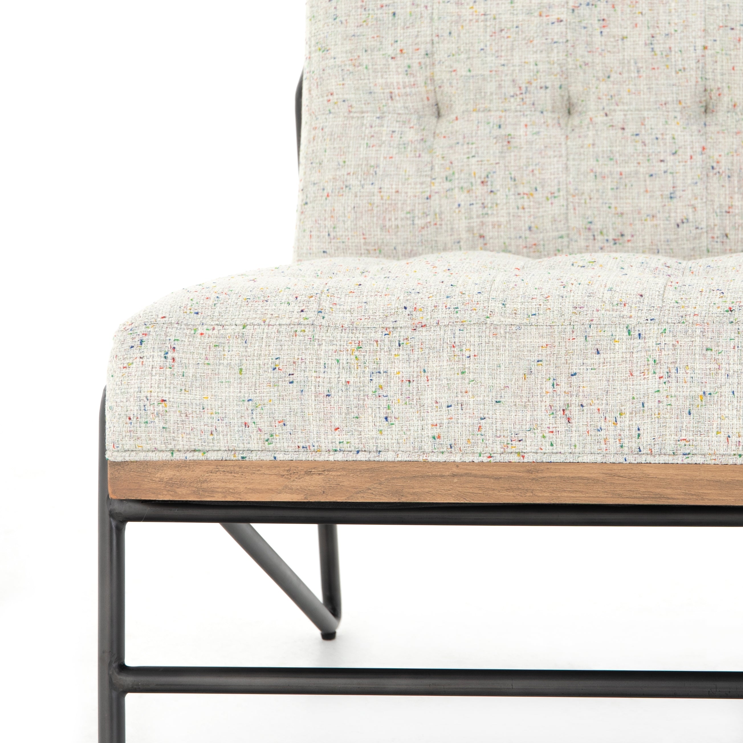 Featuring Romy Mabel Neutral Fleck Chair by Four Hands at Amethyst Home. Angular black-finished iron forms a slim hairpin frame for armless seating, with button tufting for texture. Light neutral upholstery features subtle flecks of color for a fun, fresh touch. Performance fabrics are specially created to withstand spills, stains, high traffic and wear, ensuring long-term comfo. Amethyst Home provides interior design, new construction, custom furniture, and area rugs in the Des Moines metro area.