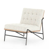 Featuring Romy Mabel Neutral Fleck Chair by Four Hands at Amethyst Home. Angular black-finished iron forms a slim hairpin frame for armless seating, with button tufting for texture. Light neutral upholstery features subtle flecks of color for a fun, fresh touch. Performance fabrics are specially created to withstand spills, stains, high traffic and wear, ensuring long-term comfor. Amethyst Home provides interior design, new construction, custom furniture, and area rugs in the San Diego metro area.