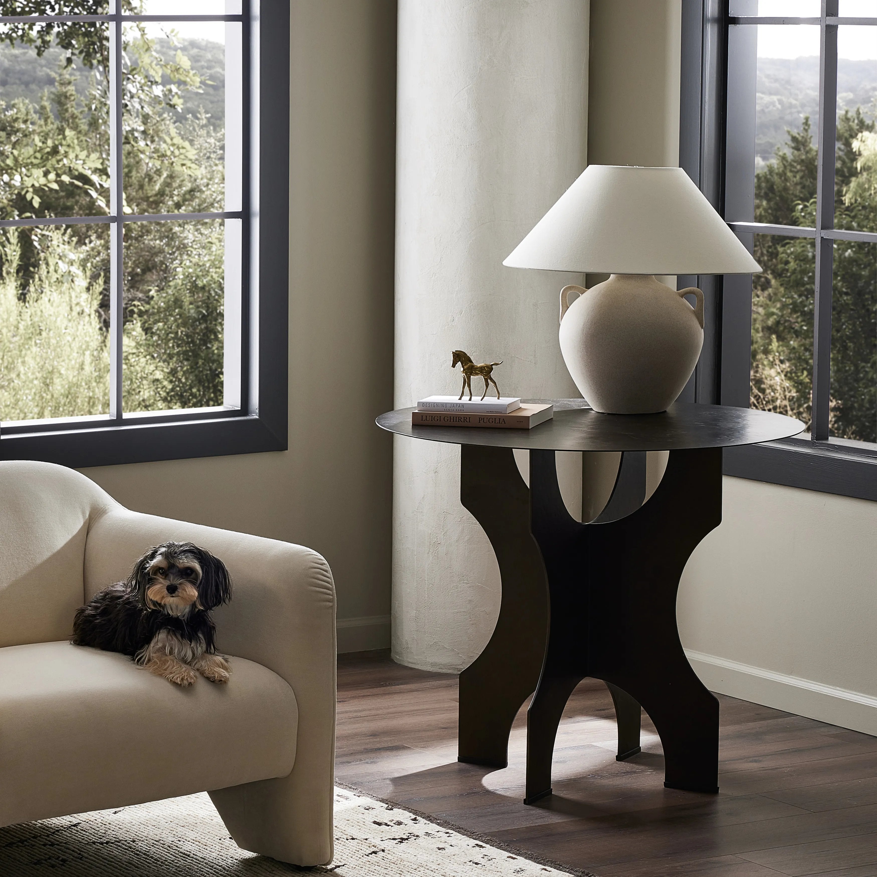 Featuring Round Bronze Side Table In Solid Iron by Four Hands at Amethyst Home. By the makers at Van Thiel, known for their antique-inspired pieces and hand-applied finishes. Solid iron with a textured bronze finish forms this unique, structured end table with industrial vibes.Overall Dimensions: 35.5"W x 35.5"L x 30"H
Collection: Van ThielColors: Bronze Ha. Amethyst Home provides interior design, new home construction design consulting, vintage area rugs, and lighting in the Calabasas metro area.
