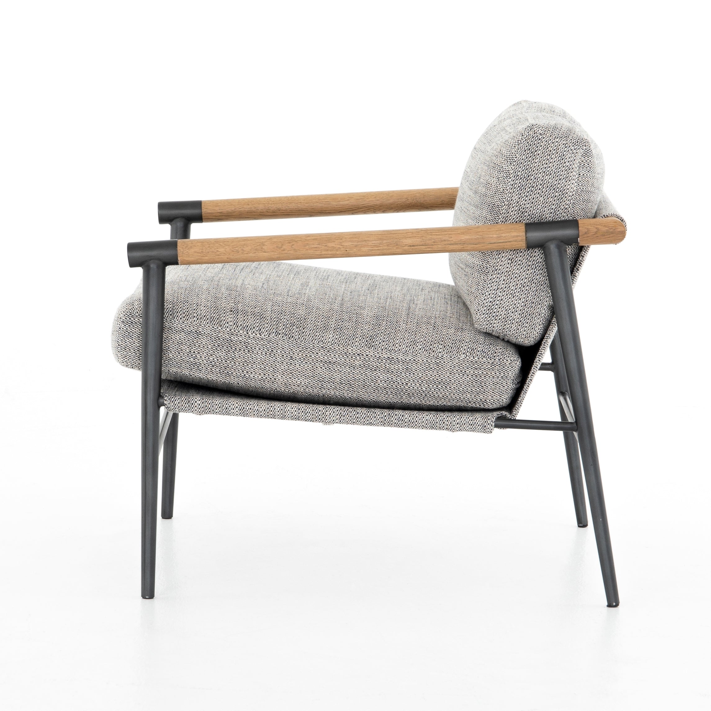 Featuring Rowen Chair - Thames Raven by Four Hands at Amethyst Home. Textural grey seating of performance-grade upholstery, with angular arms of exposed oak providing fresh contrast. Slim, carbon-finished steel legs for a dose of modern-industrial edge. Performance fabrics are specially created to withstand spills, stains, high traffic and wear, ensuring long-. Amethyst Home provides interior design, new home construction design consulting, vintage area rugs, and lighting in the Boston metro area.