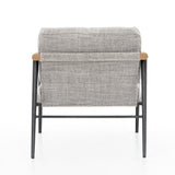 Featuring Rowen Chair - Thames Raven by Four Hands at Amethyst Home. Textural grey seating of performance-grade upholstery, with angular arms of exposed oak providing fresh contrast. Slim, carbon-finished steel legs for a dose of modern-industrial edge. Performance fabrics are specially created to withstand spills, stains, high traffic and wear, ensuring long. Amethyst Home provides interior design, new home construction design consulting, vintage area rugs, and lighting in the Houston metro area.