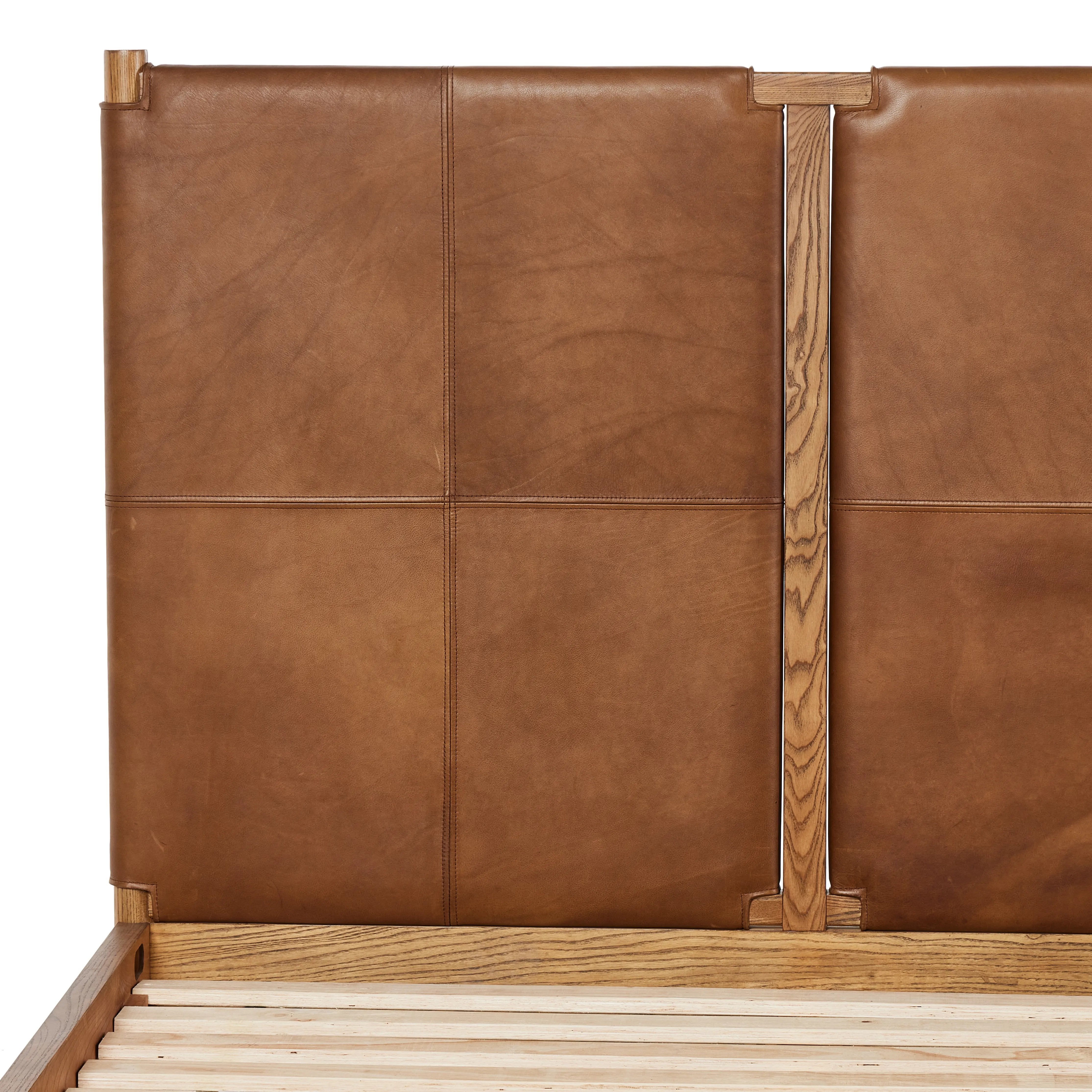 Featuring Salado Heirloom Sienna-Queen Bed by Four Hands at Amethyst Home. Solid ash framing and heirloom leather panel details craft this safari-inspired bed frame. Sourced from one of the oldest family-owned tanneries in Italyâ€™s Bassano del Grappa, our heirloom leather covering is salvaged and processed from upcycled hides featuring an abundance of natu. Amethyst Home provides interior design, new home construction design consulting, vintage area rugs, and lighting in the Nashville metro area.